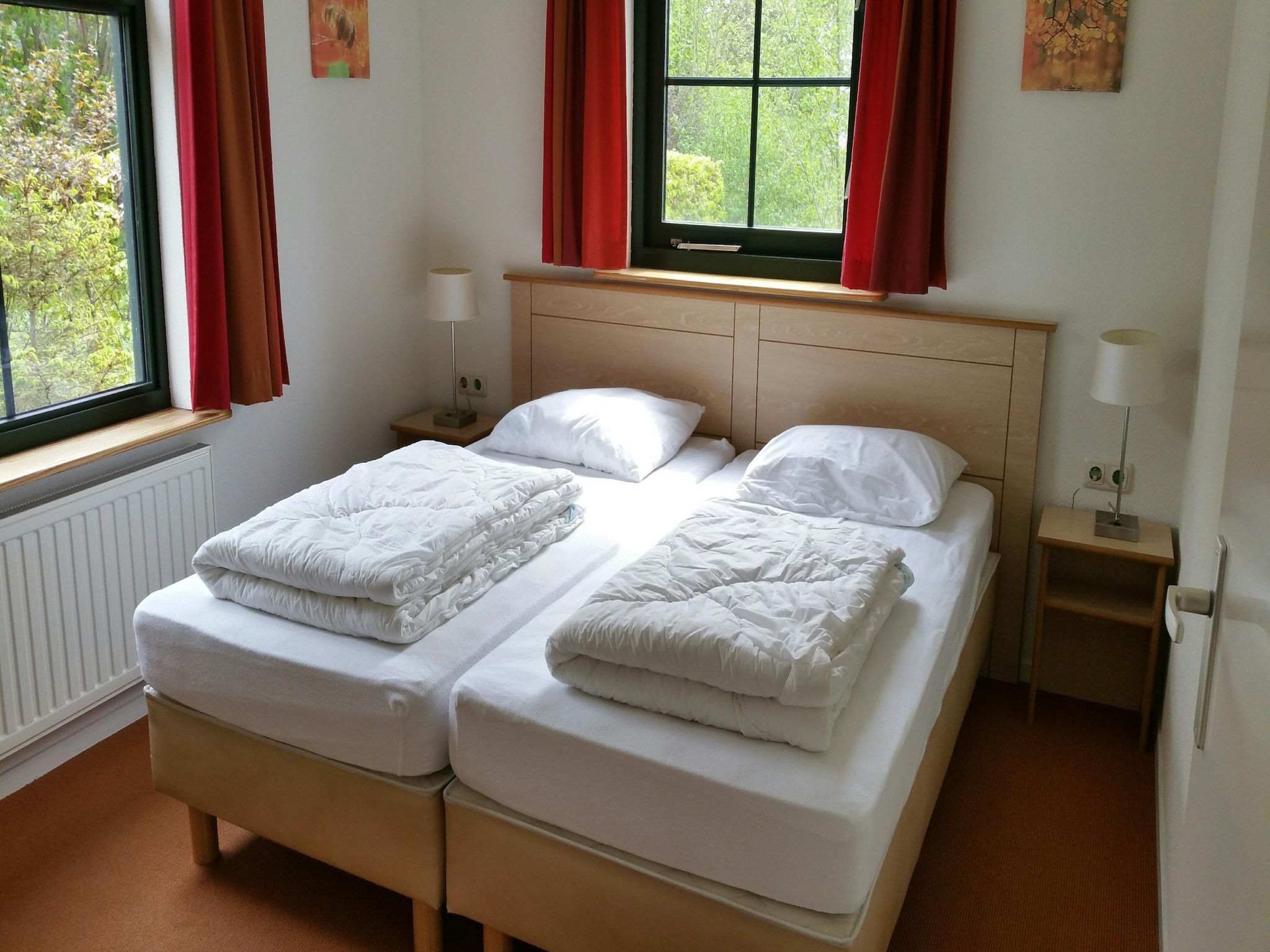 Een slaapkamer van Vakantiepark Eigen Wijze 3 in Bant