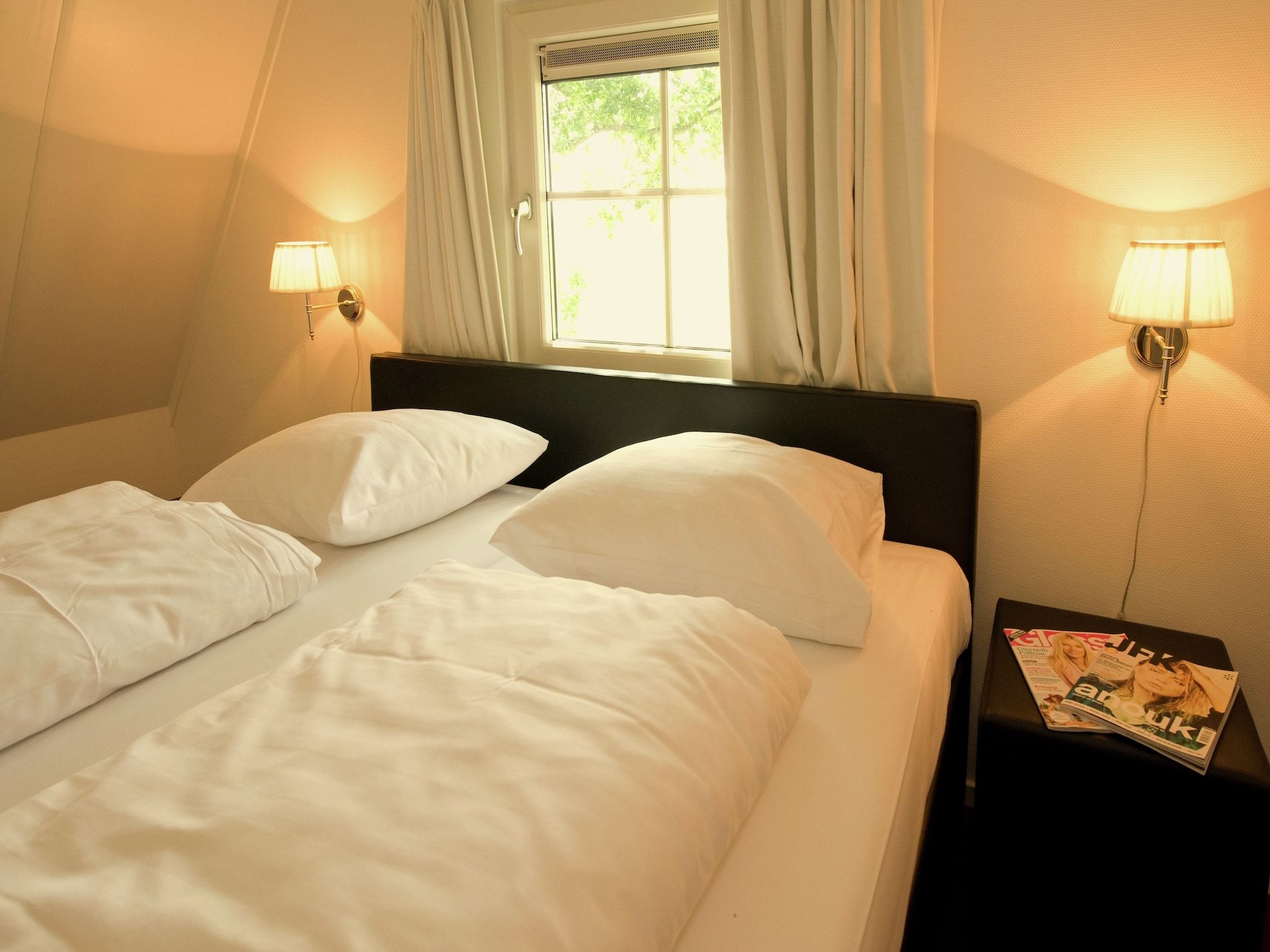 Een slaapkamer van Hof van Salland 3 in Hellendoorn