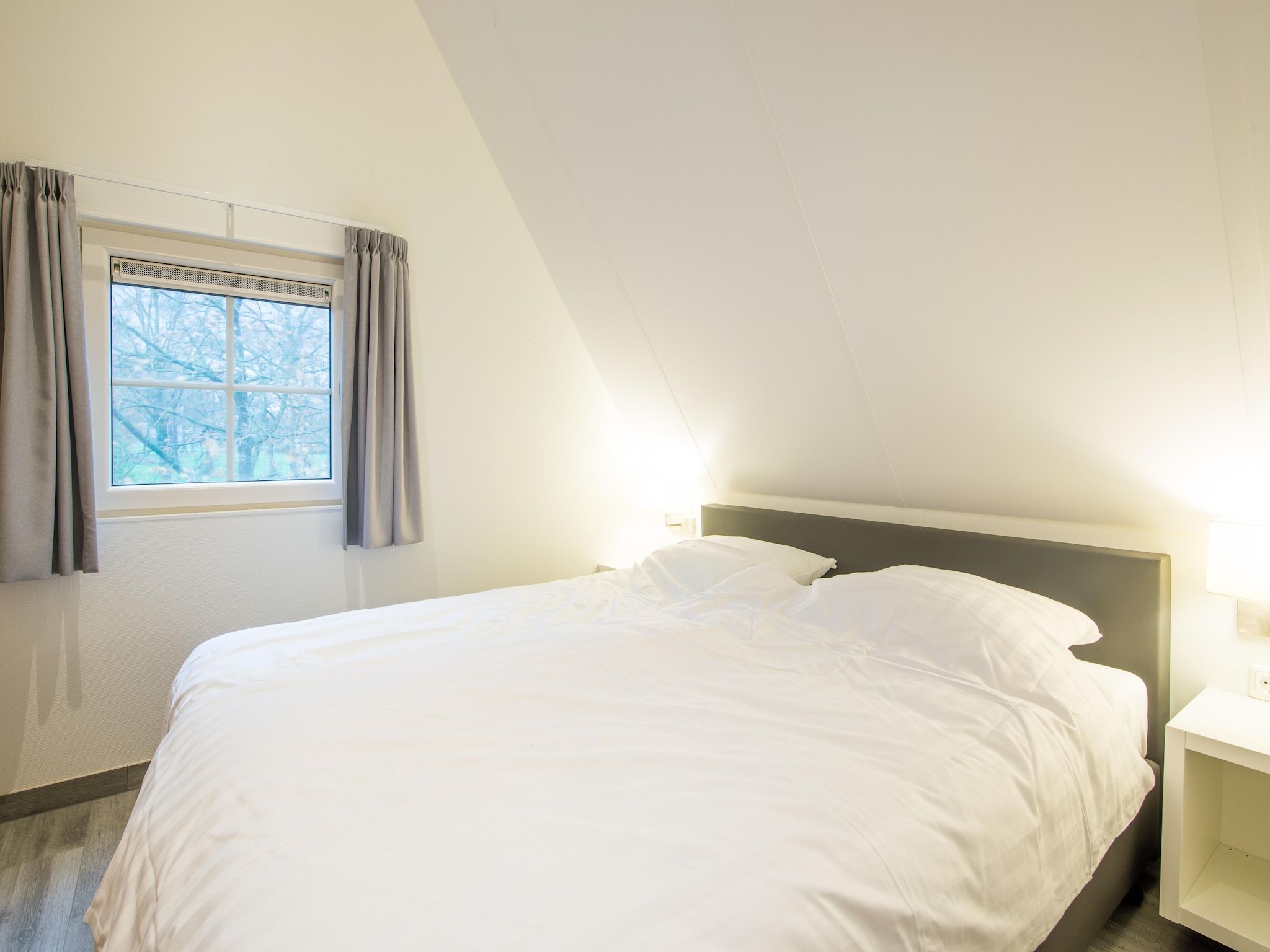 Een slaapkamer van Hof van Salland 7 in Hellendoorn