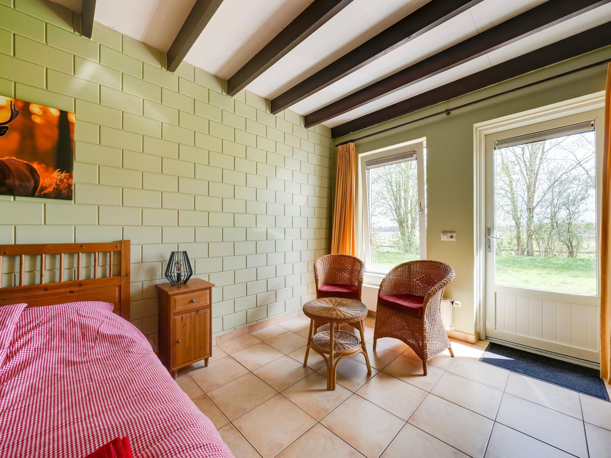 Een slaapkamer van De Kibbelhoeve in Kibbelveen