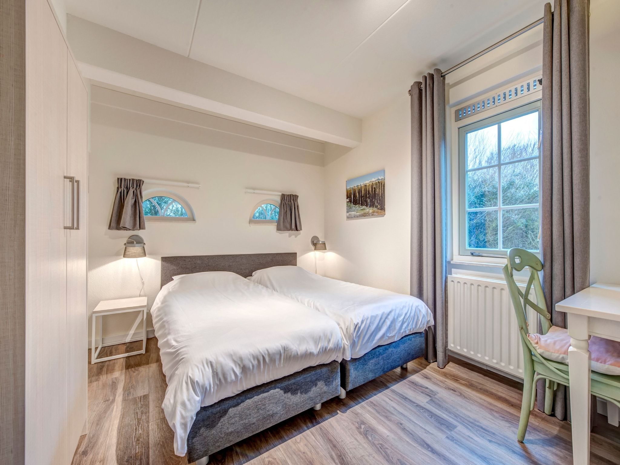 Een slaapkamer van Buitenhof Domburg 1 in Domburg