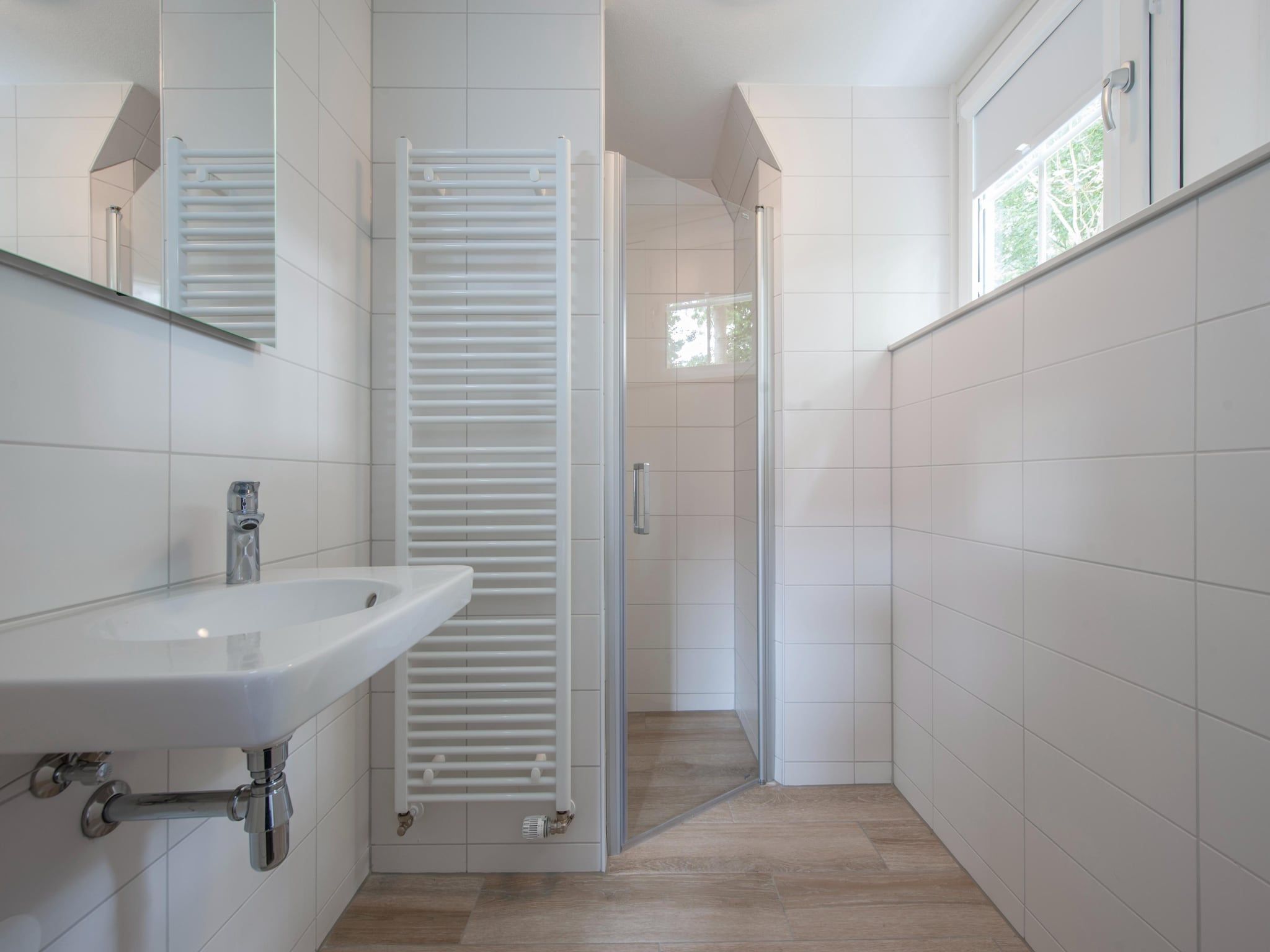 De badkamer van Noordzee Résidence Dishoek 8 in Koudekerke