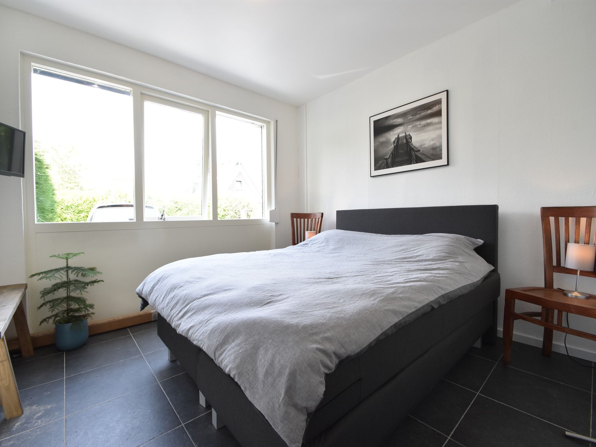 Een slaapkamer van Het Mosselhuys in Bruinisse