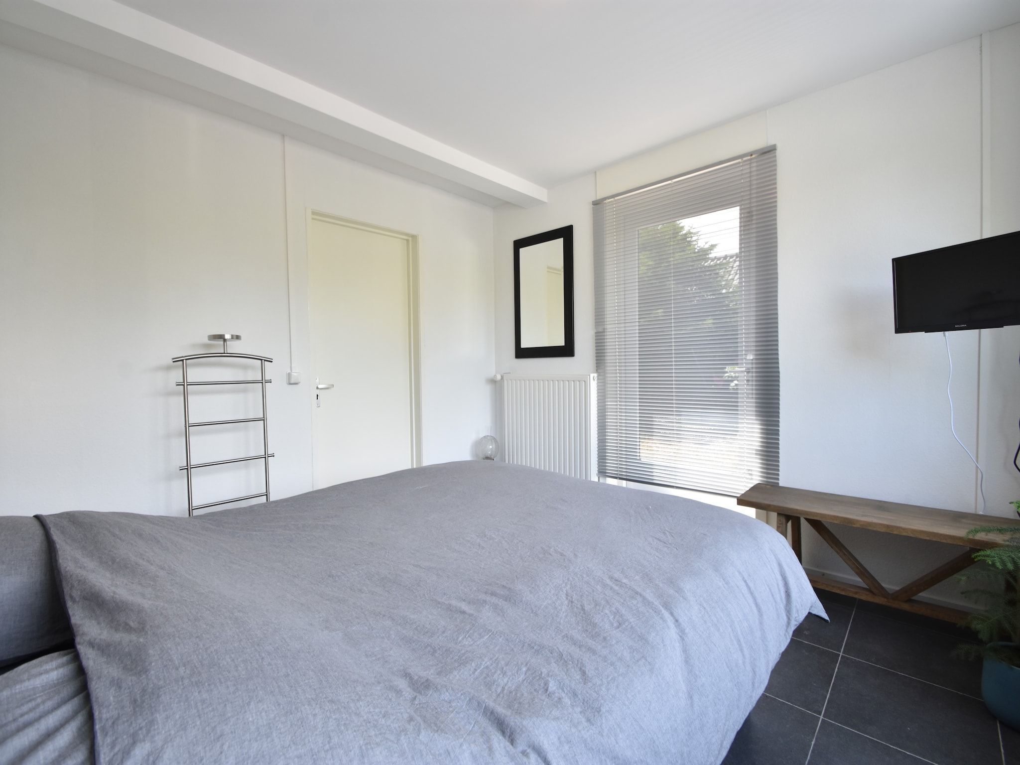 Een slaapkamer van Het Mosselhuys in Bruinisse