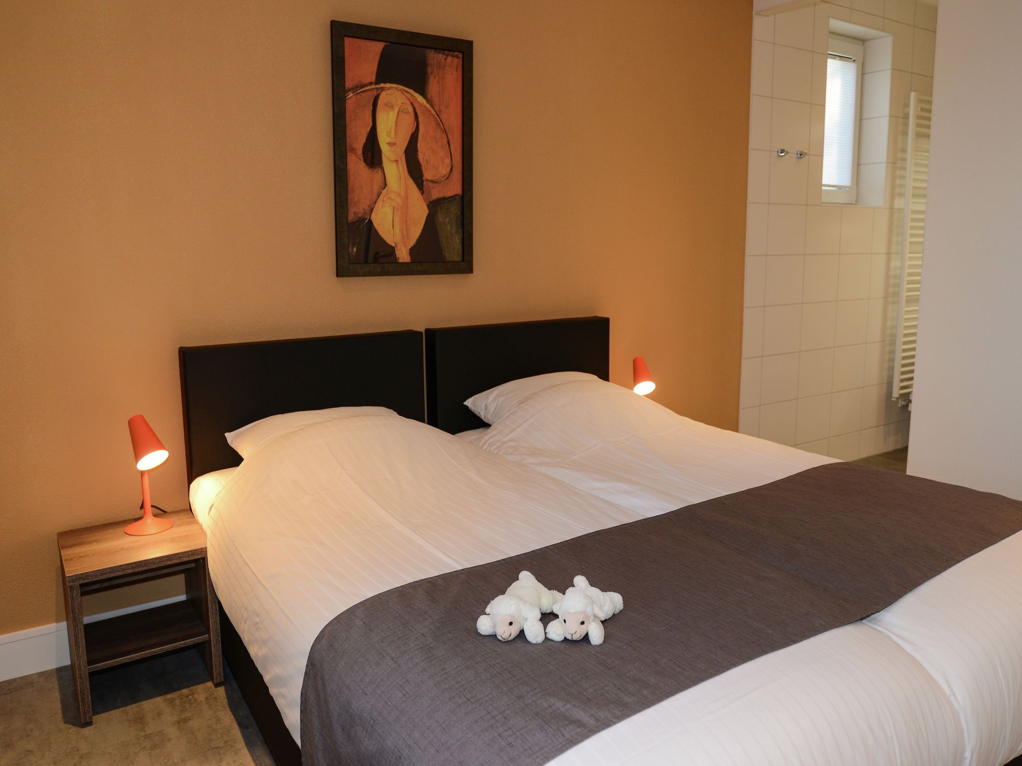 Een slaapkamer van Tempelier 39 in Den Burg-Texel