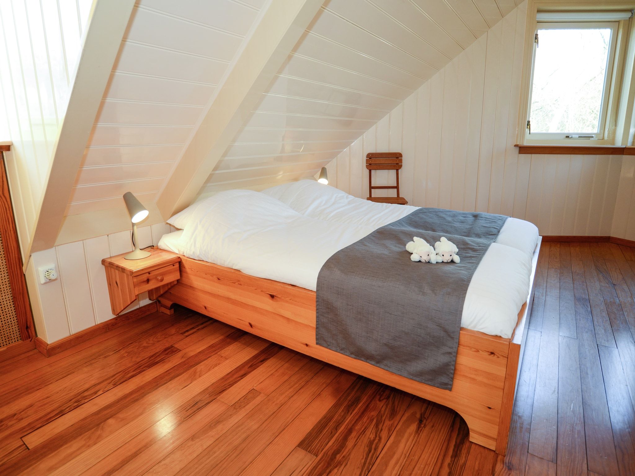 Een slaapkamer van De Ransuil in De Cocksdorp-Texel