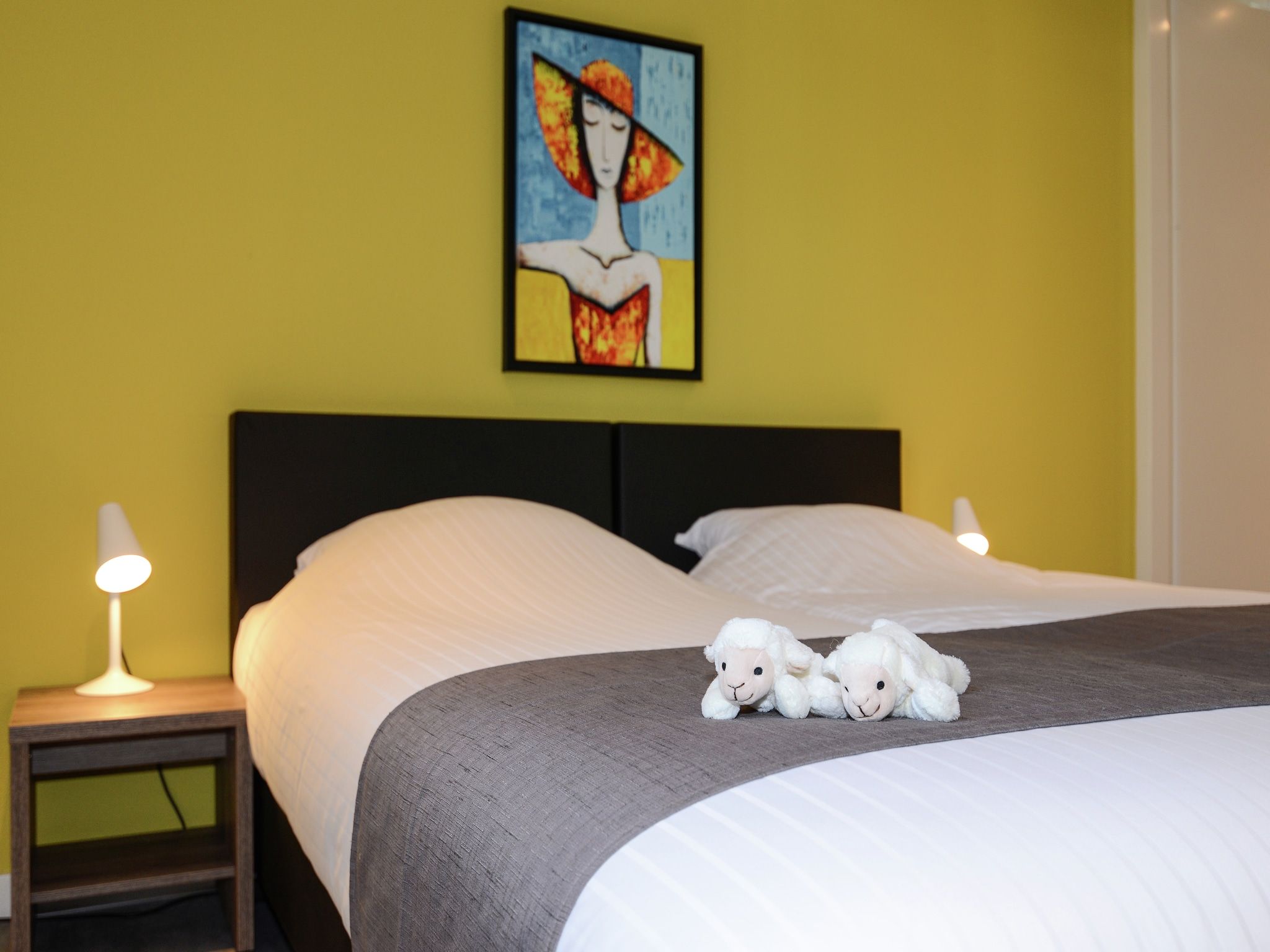 Een slaapkamer van Villa  Hoogeland 106L in De Koog-Texel