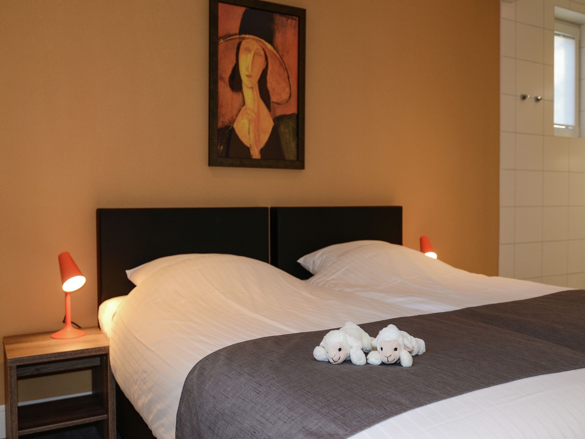 Een slaapkamer van Villa  Hoogelandt 10 in De Koog Texel