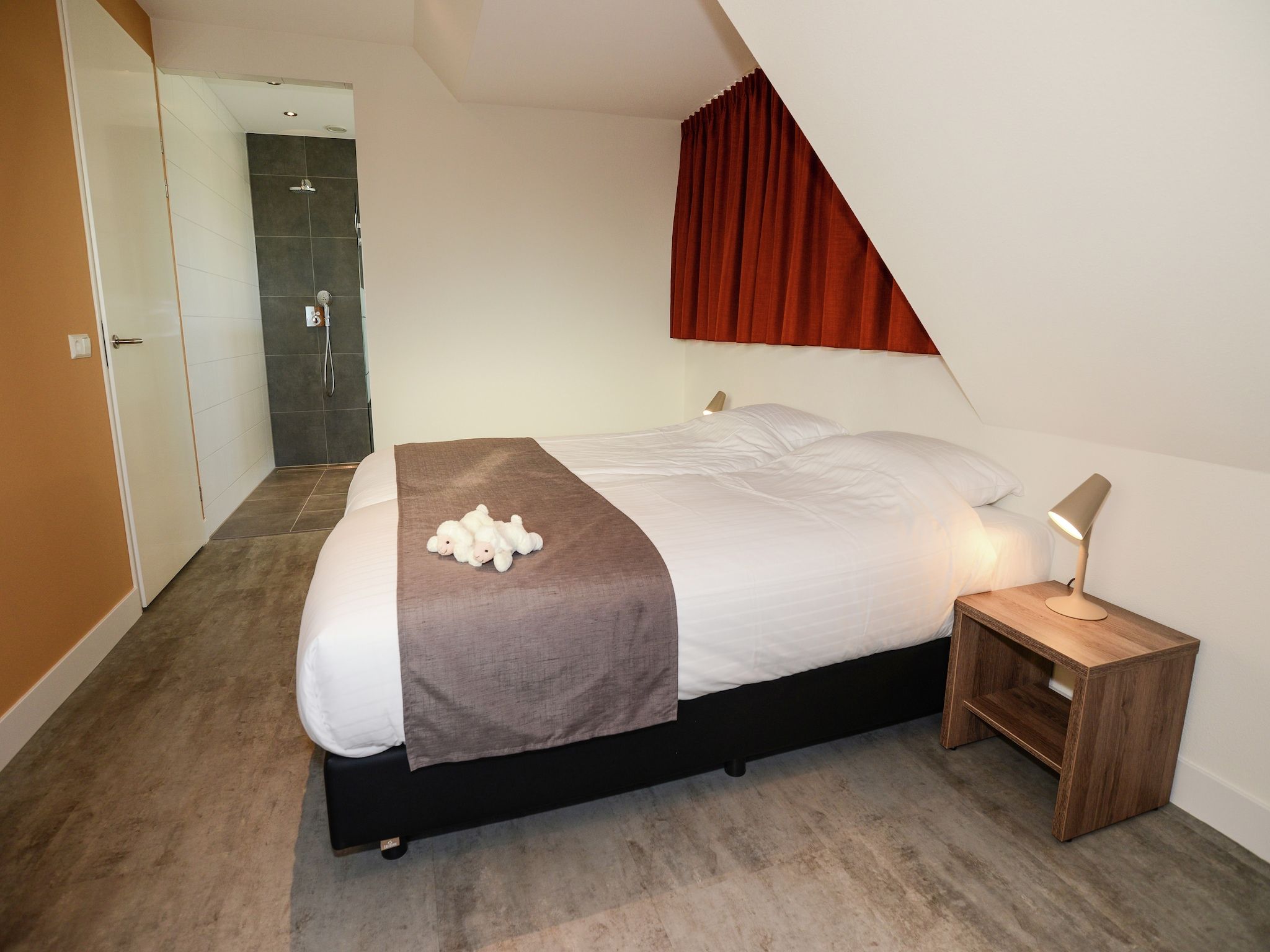 Een slaapkamer van Villa  Hoogelandt 10 in De Koog Texel