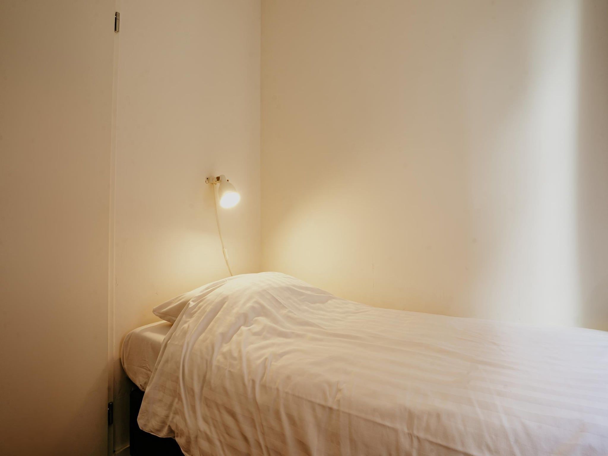 Een slaapkamer van Waterpark de Meerparel 8 in Uitgeest