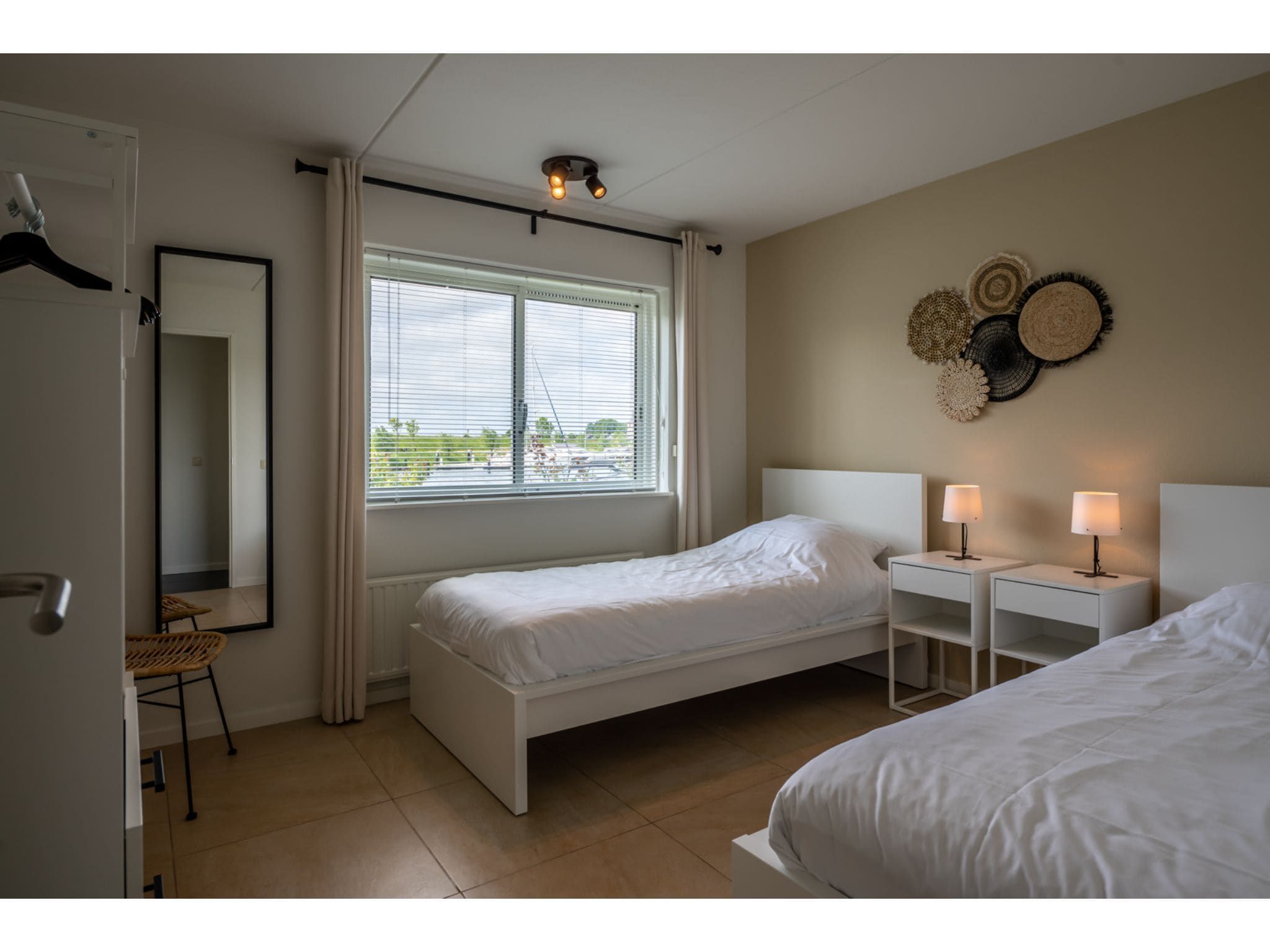 Een slaapkamer van Veerdam 42 in Kortgene