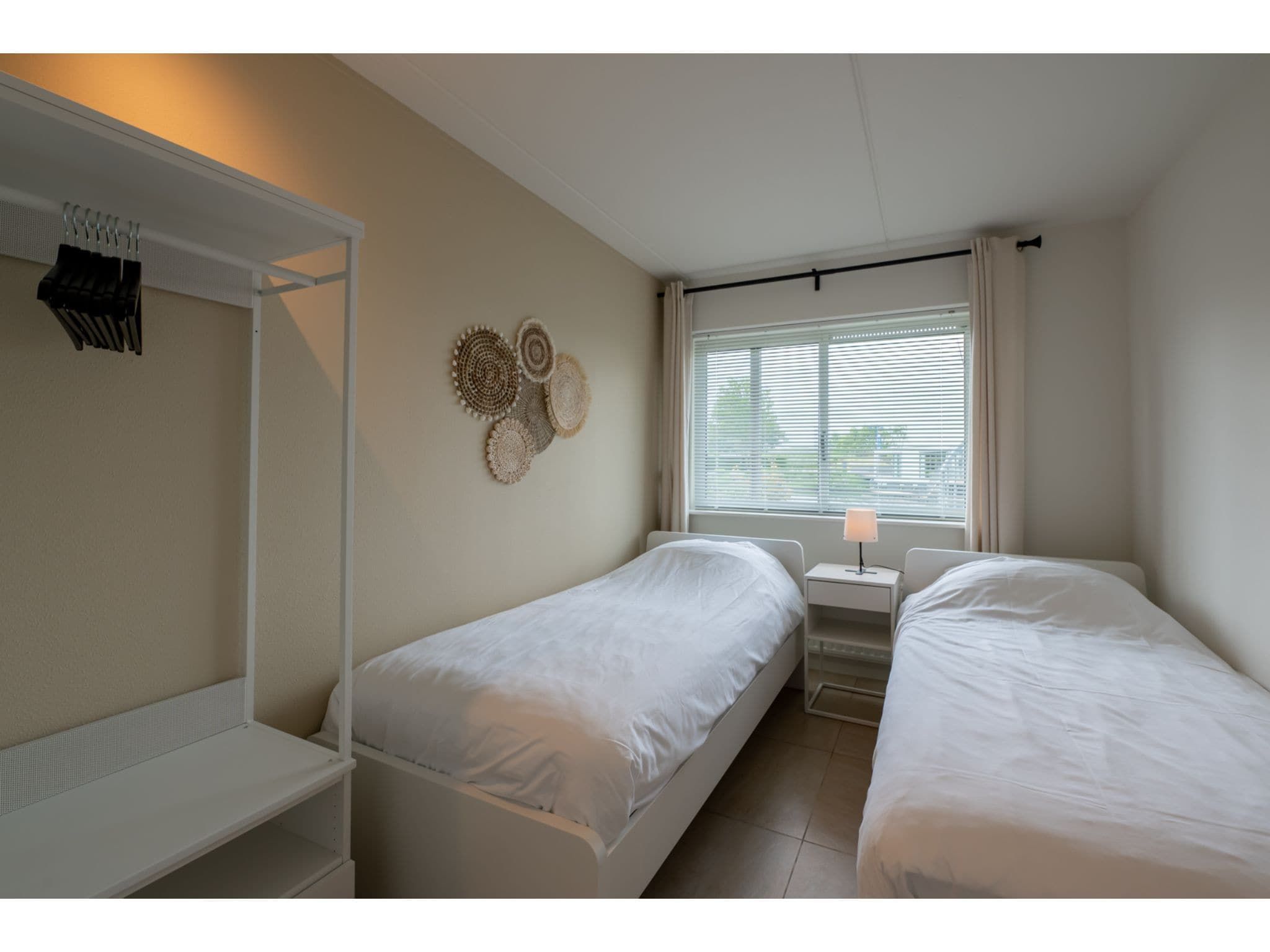 Een slaapkamer van Veerdam 42 in Kortgene