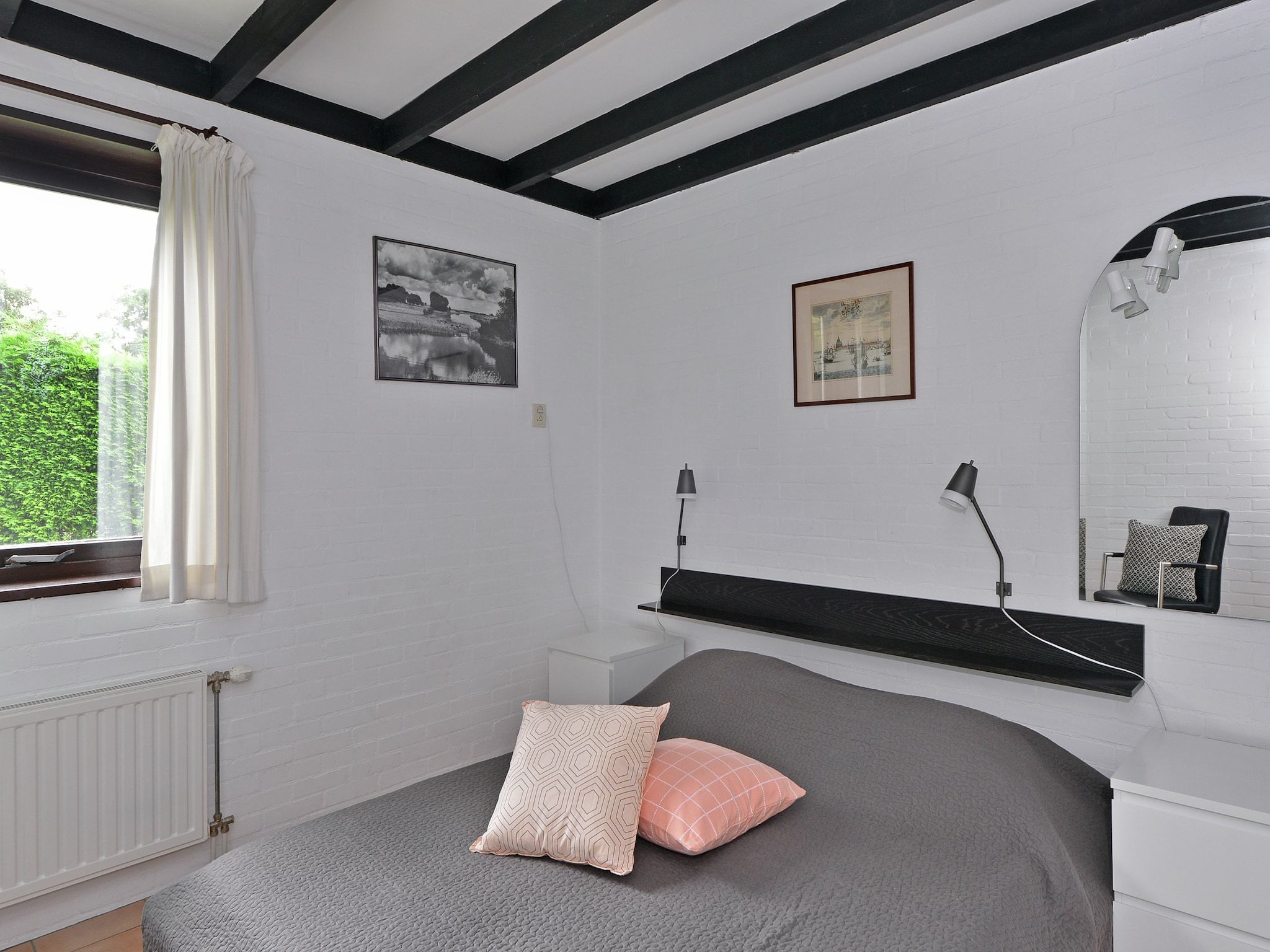 Een slaapkamer van Cederlaan 8 in Kamperland