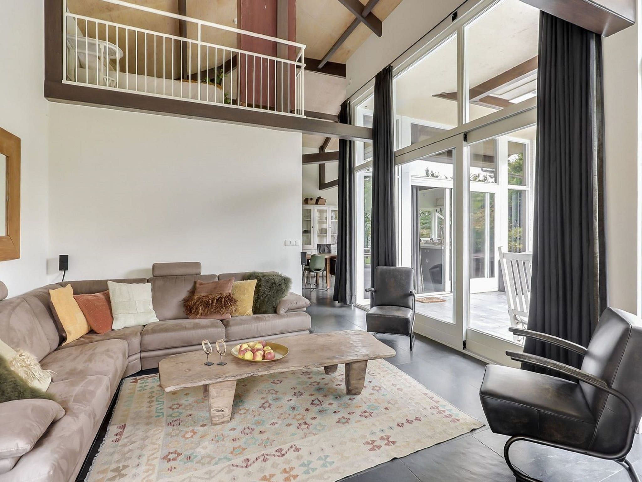 De woonkamer van Vakantiepark Sandberghe 7 in Uden