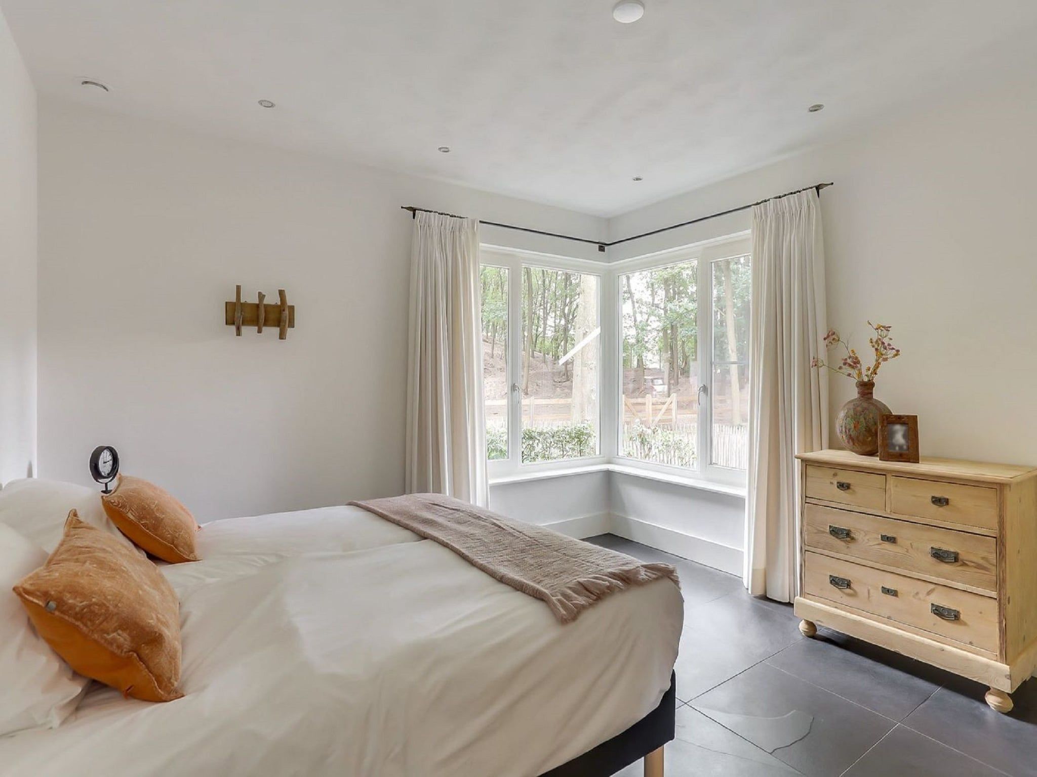 Een slaapkamer van Vakantiepark Sandberghe 7 in Uden