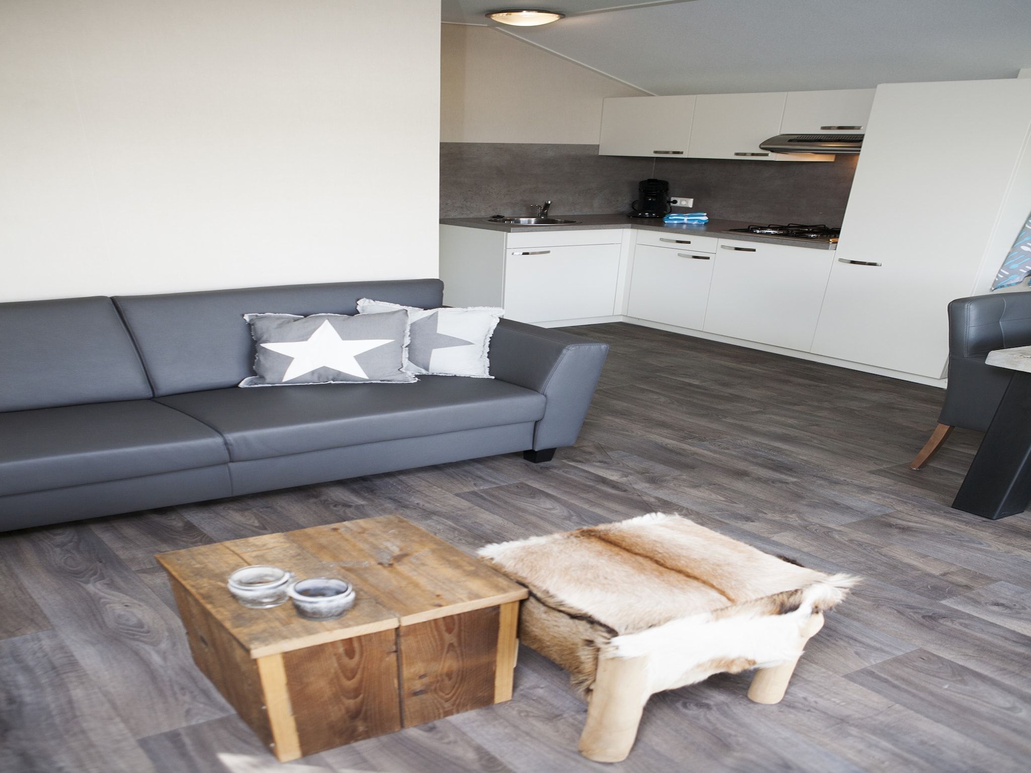 De woonkamer van Recreatiepark de Boshoek 9 in Voorthuizen