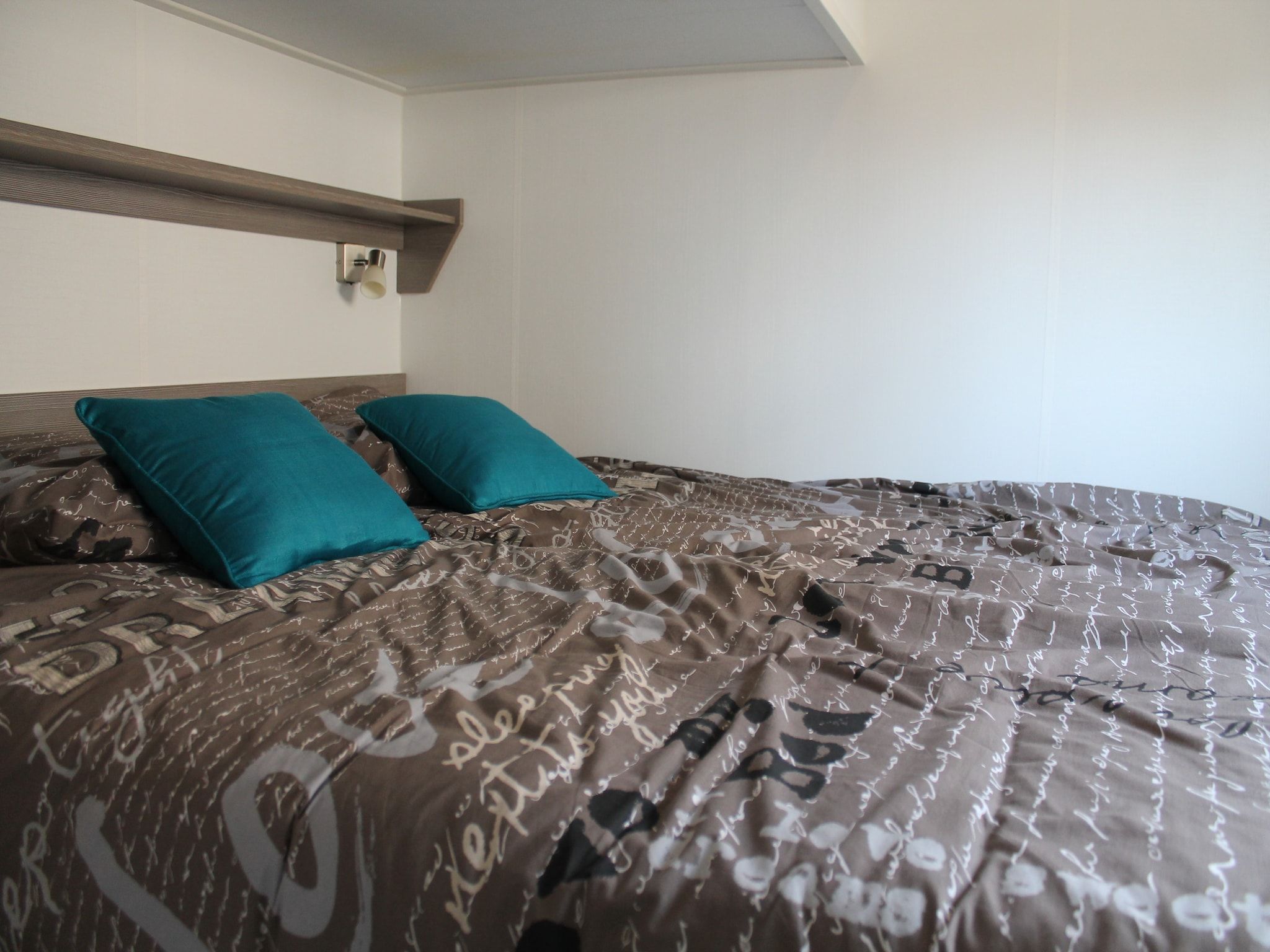 Een slaapkamer van Recreatiepark de Boshoek 9 in Voorthuizen