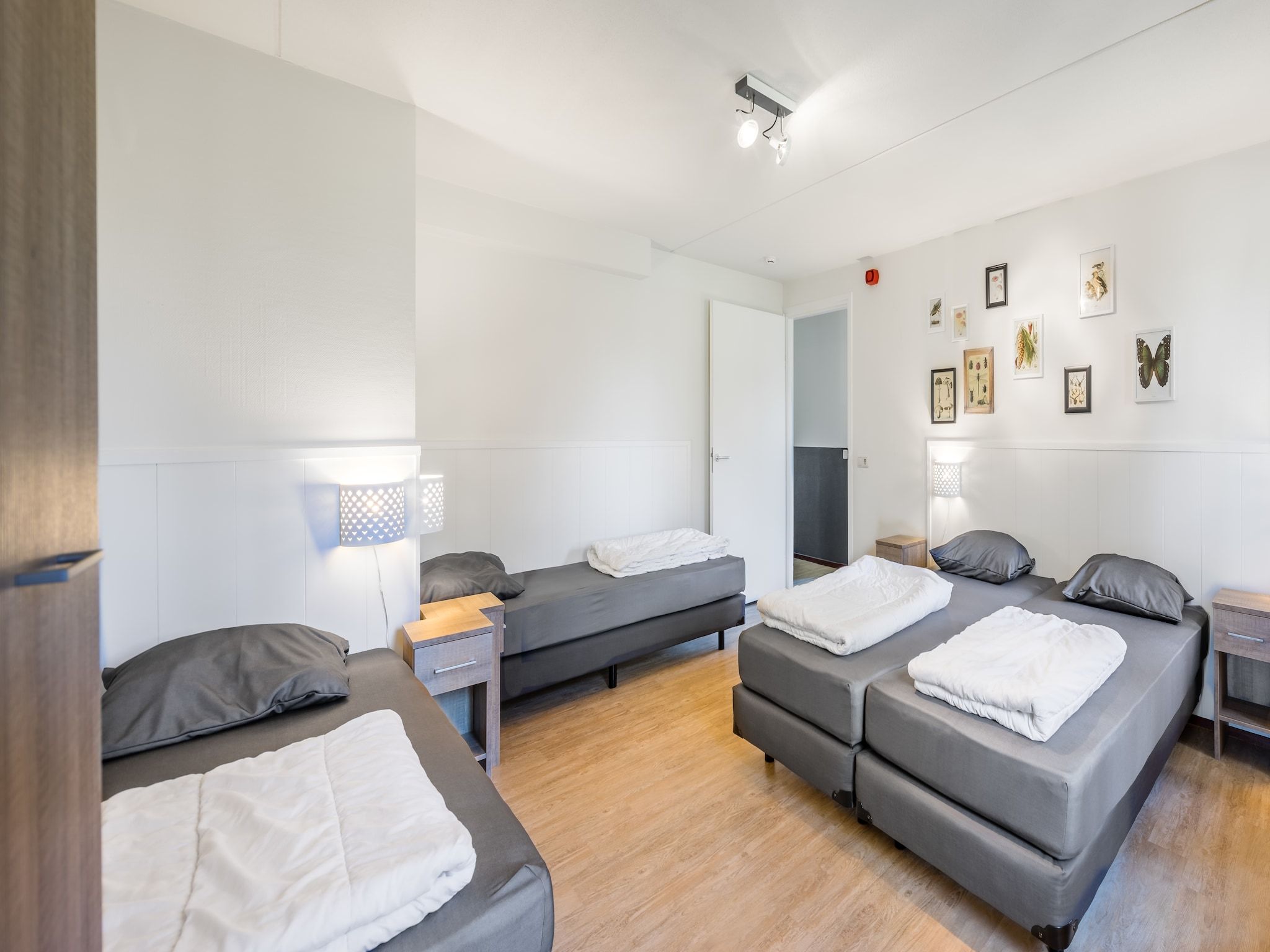 Een slaapkamer van Vakantiepark Weerterbergen 7 in Weert