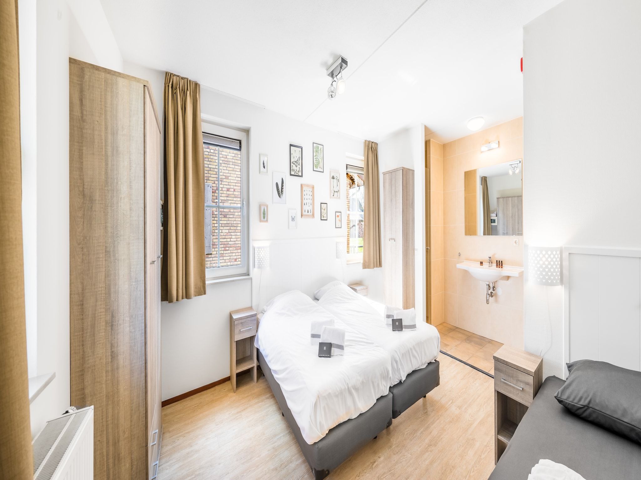 Een slaapkamer van Vakantiepark Weerterbergen 7 in Weert