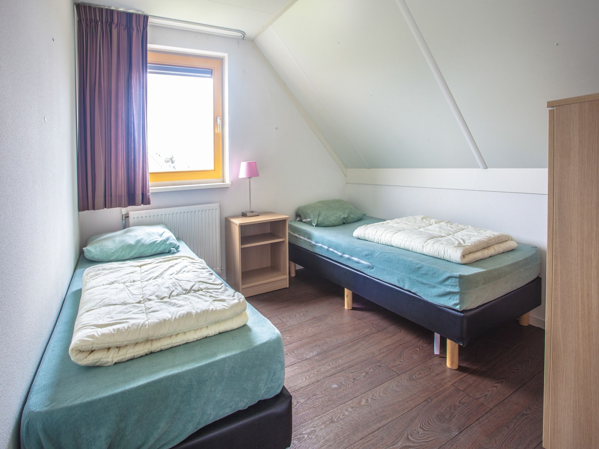 Een slaapkamer van Vlietstroom 6 in Medemblik
