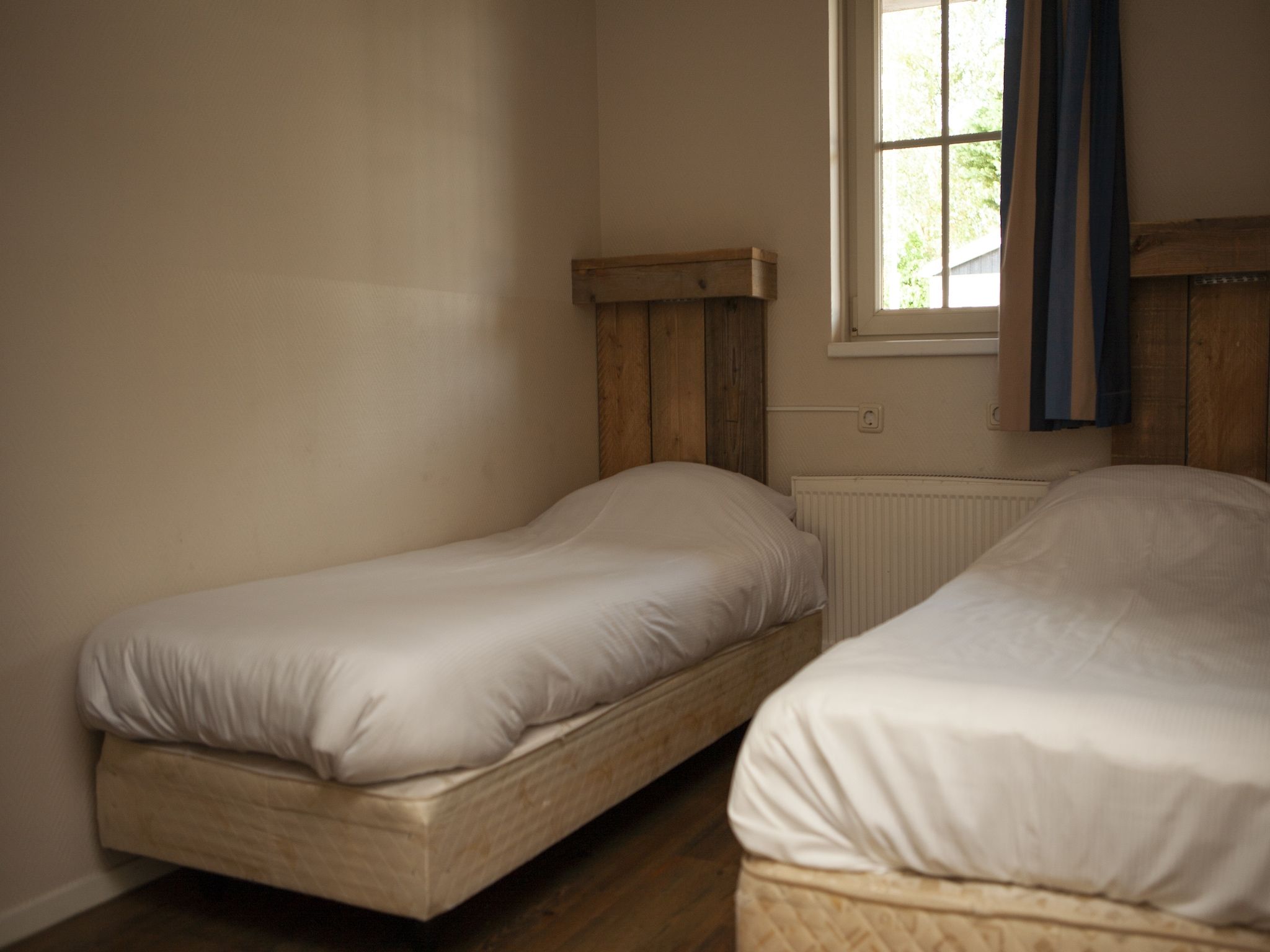 Een slaapkamer van Recreatiepark de Boshoek 14 in Voorthuizen