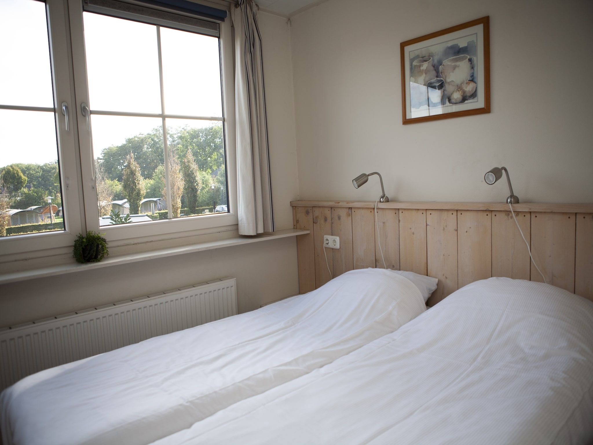 Een slaapkamer van Recreatiepark de Boshoek 17 in Voorthuizen