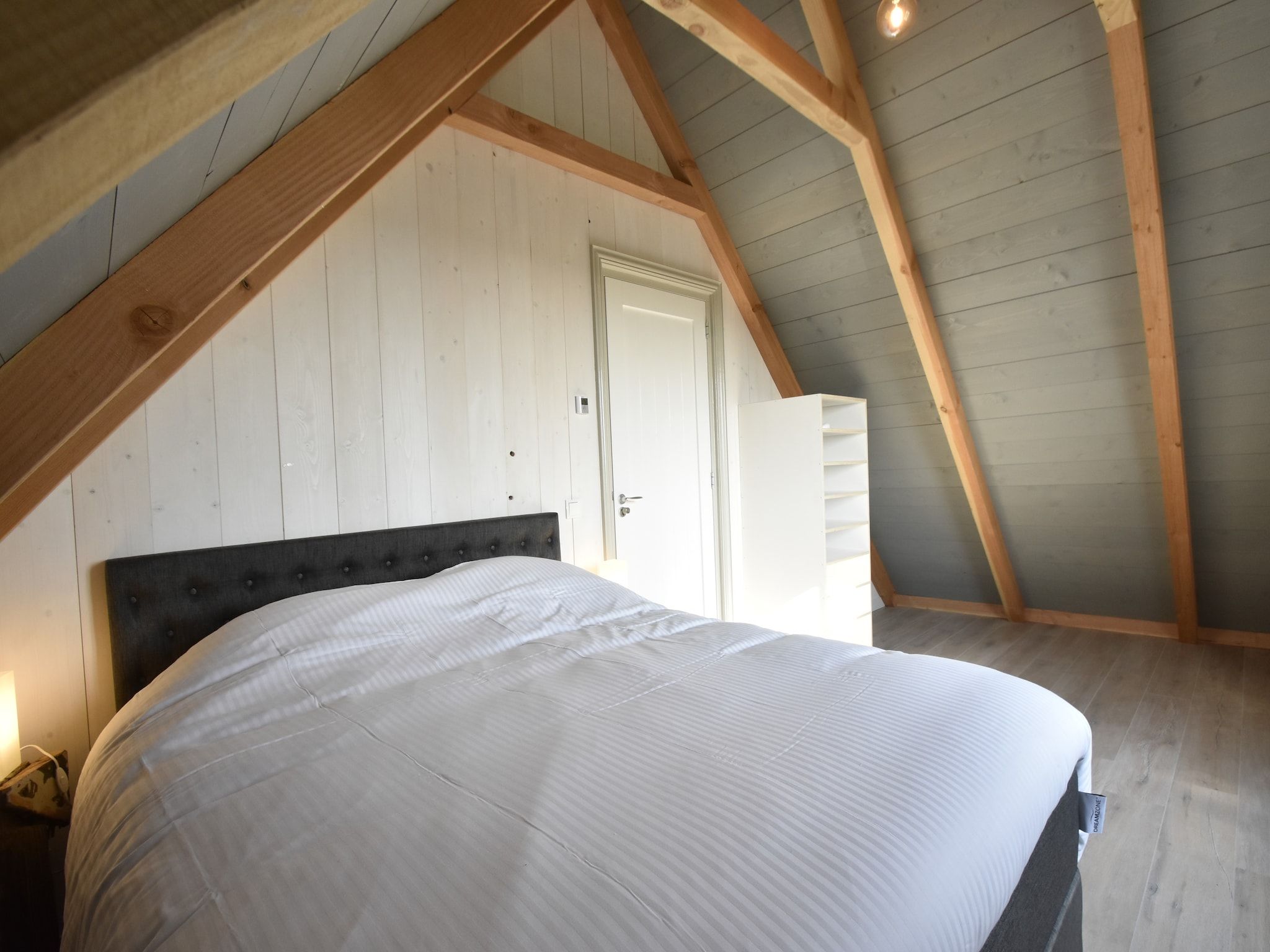 Een slaapkamer van Hazenborgh - Strandhuys in Callantsoog