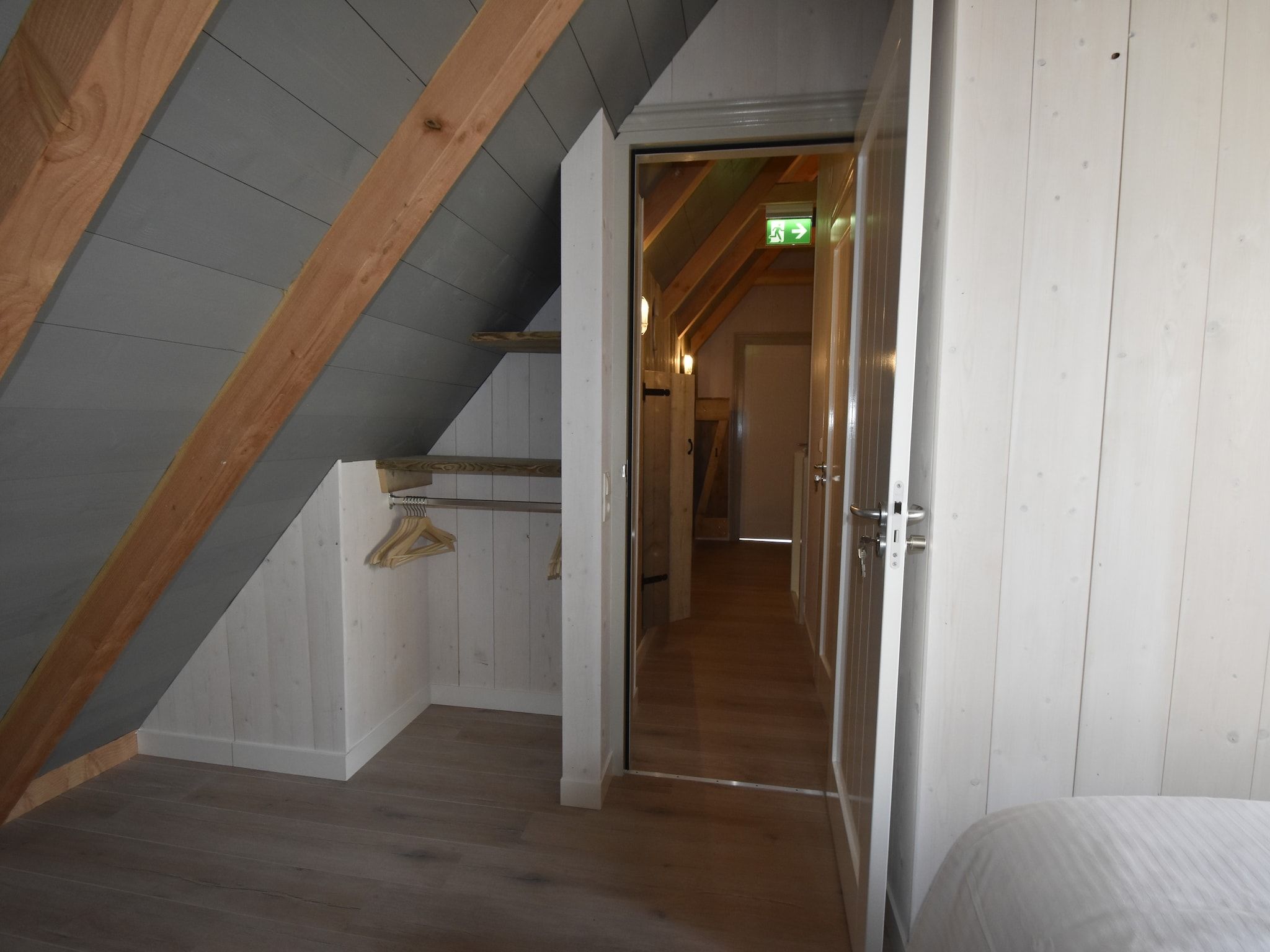 Een slaapkamer van Hazenborgh - Strandhuys in Callantsoog