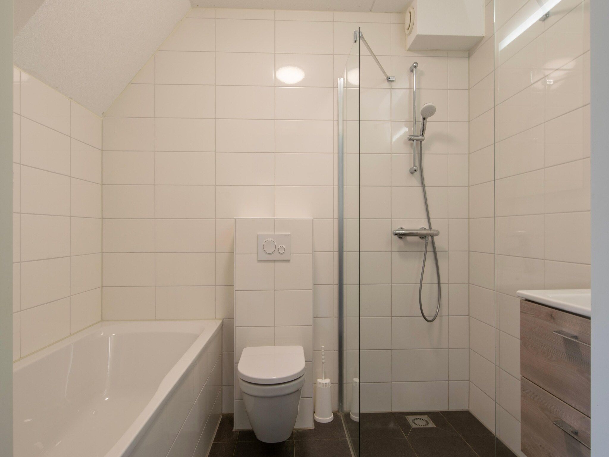 De badkamer van Vakantiepark de Soeten Haert 14 in Renesse