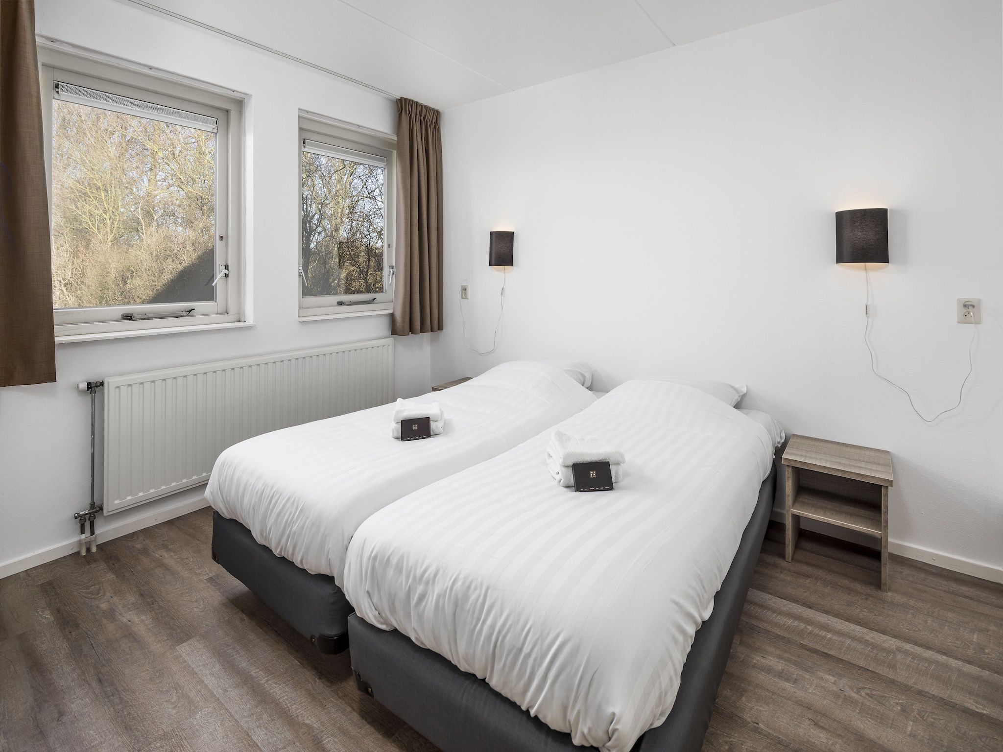 Een slaapkamer van Vakantiepark de Soeten Haert 16 in Renesse