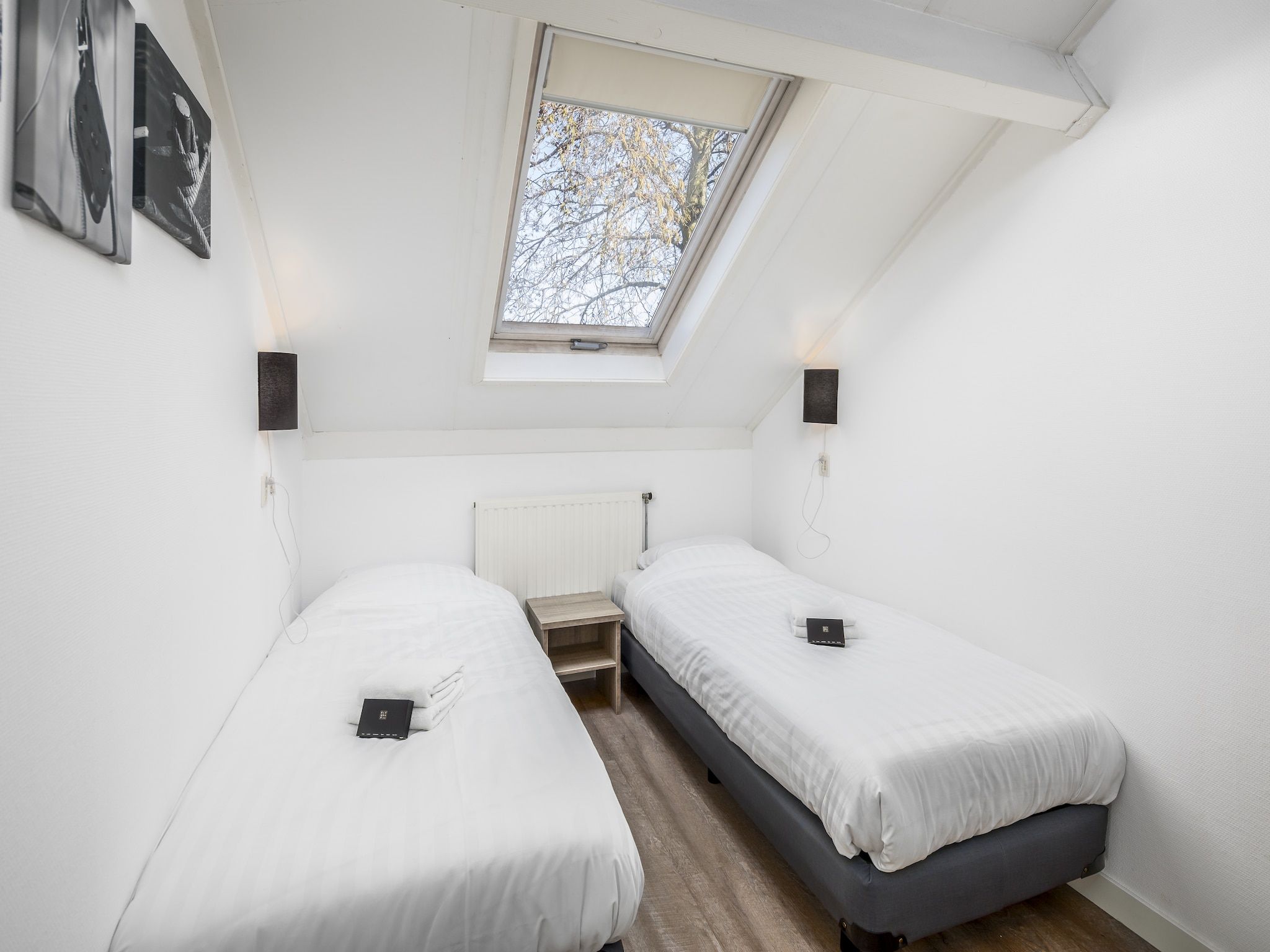 Een slaapkamer van Vakantiepark de Soeten Haert 16 in Renesse