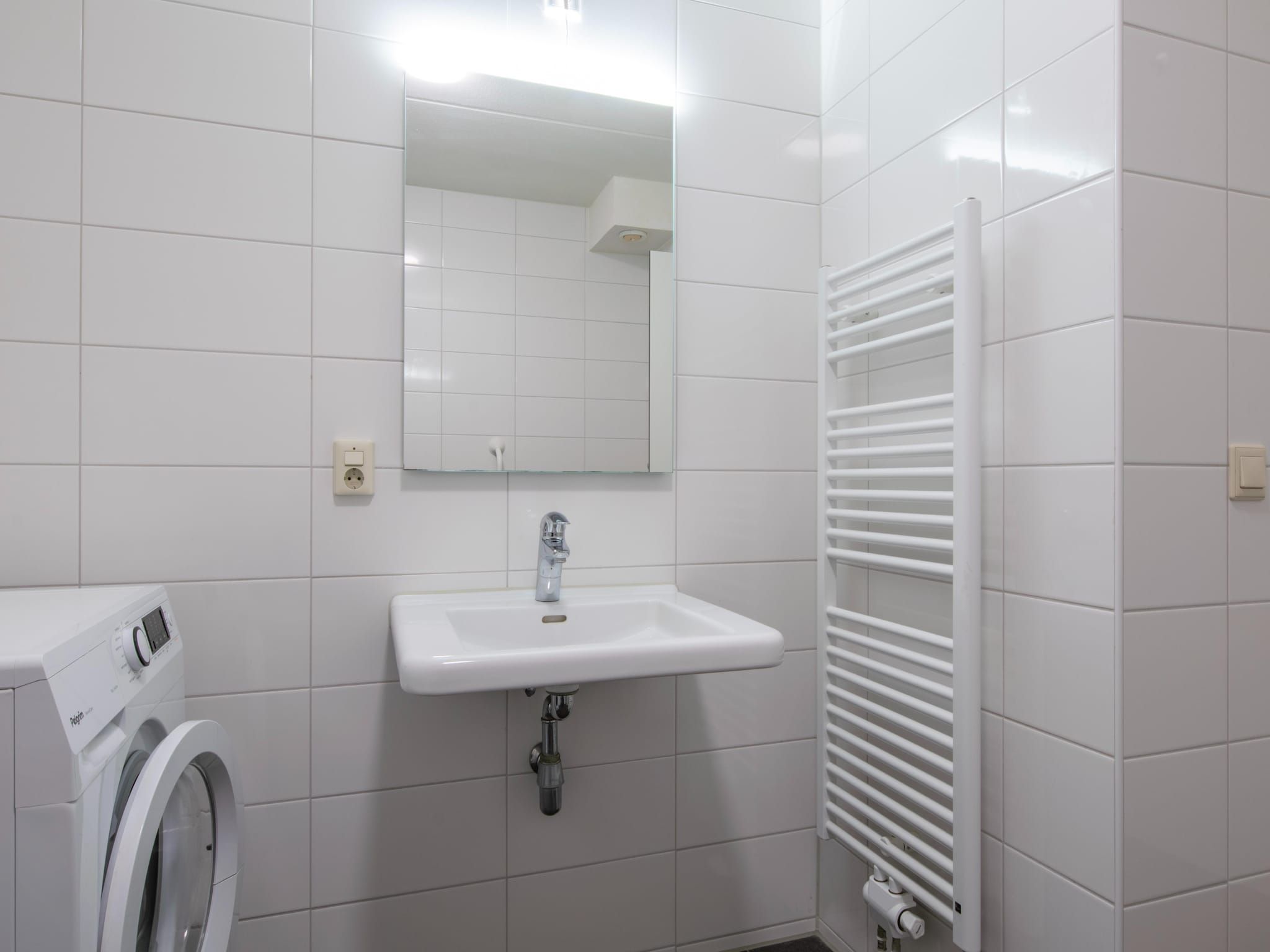 De badkamer van Vakantiepark de Soeten Haert 17 in Renesse