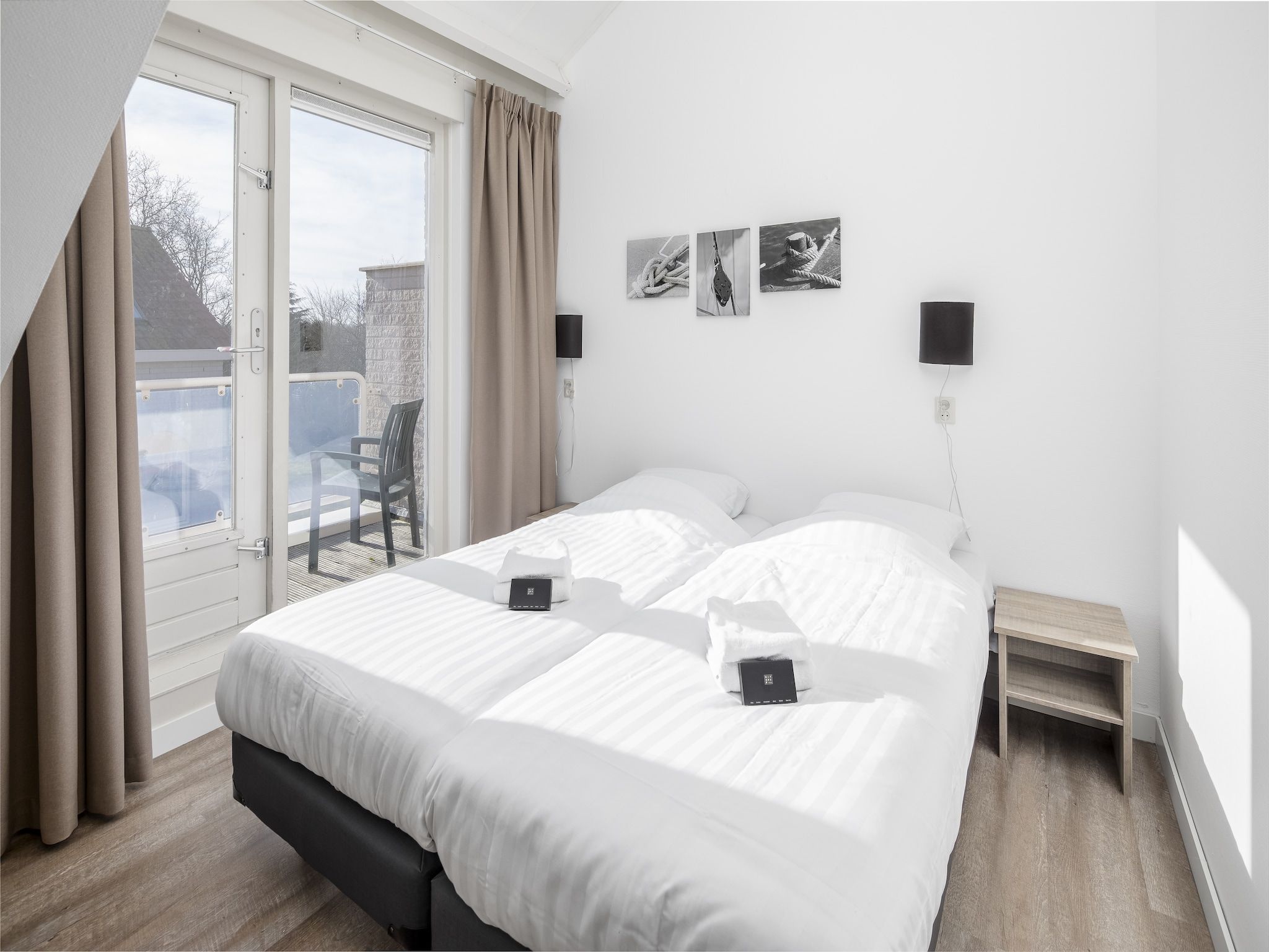 Een slaapkamer van Vakantiepark de Soeten Haert 17 in Renesse