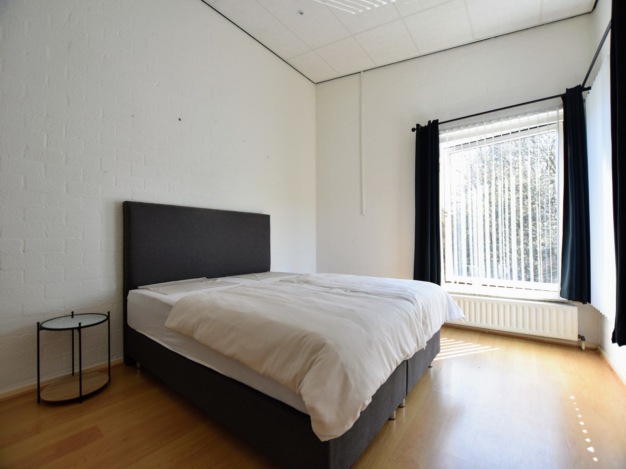 Een slaapkamer van Geulhuisje II in Walem