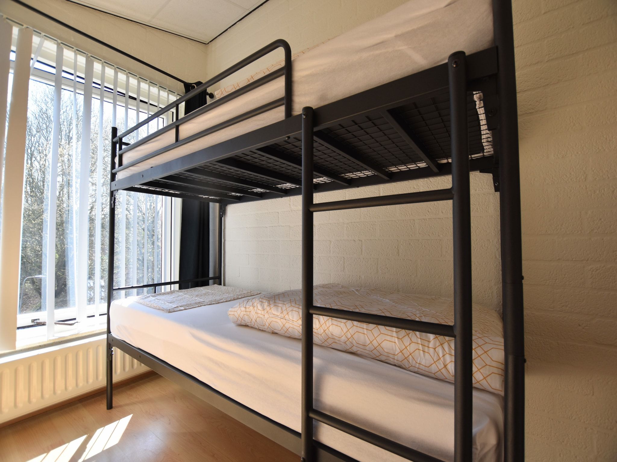 Een slaapkamer van Geulhuisje II in Walem