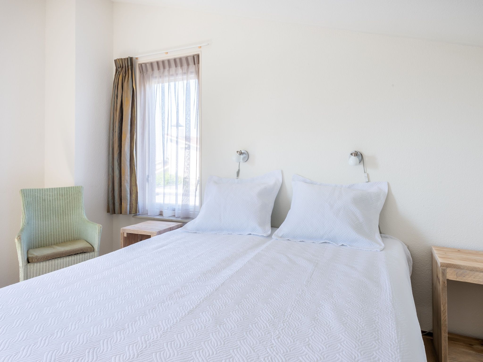 Een slaapkamer van Cardium 33 in Kamperland