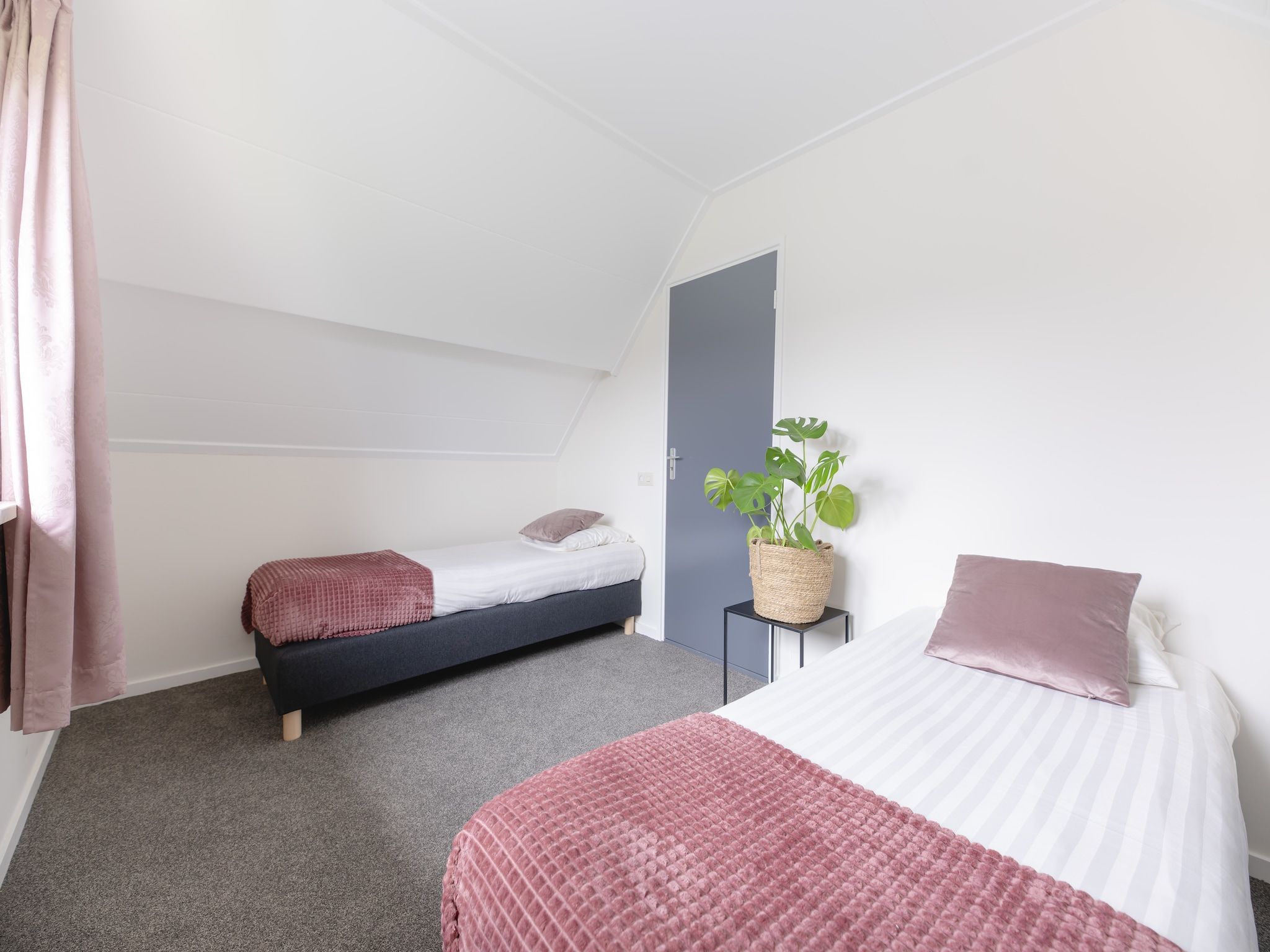 Een slaapkamer van Vakantiepark Mölke 16 in Zuna