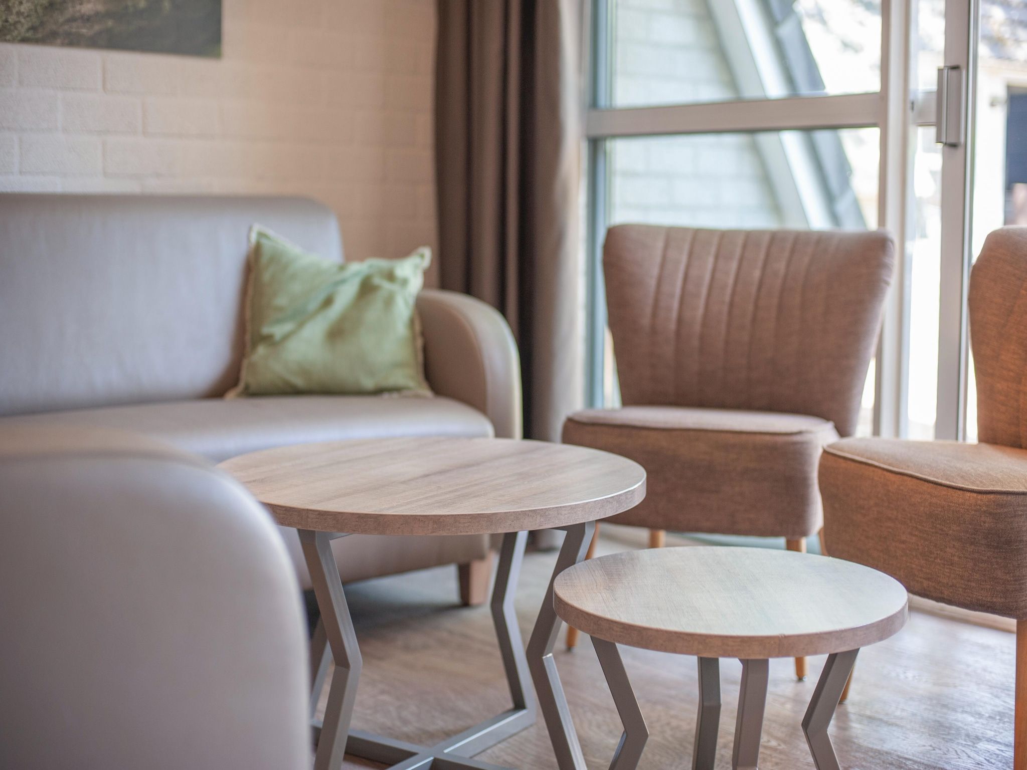 De woonkamer van Vakantiepark de Katjeskelder 10 in Oosterhout