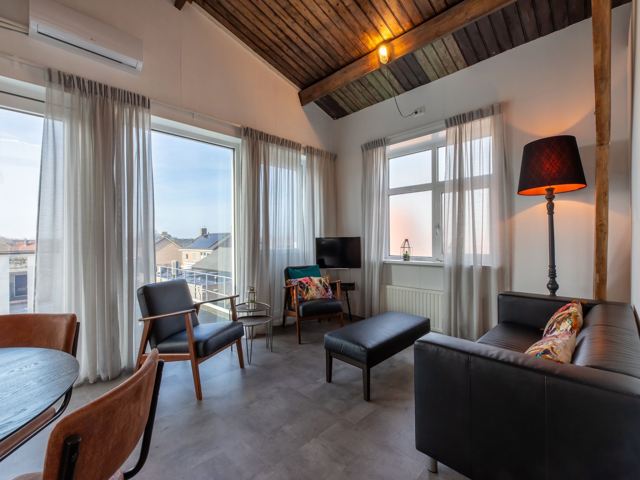 De woonkamer van Groepsappartement Pleinzicht in Koudekerke