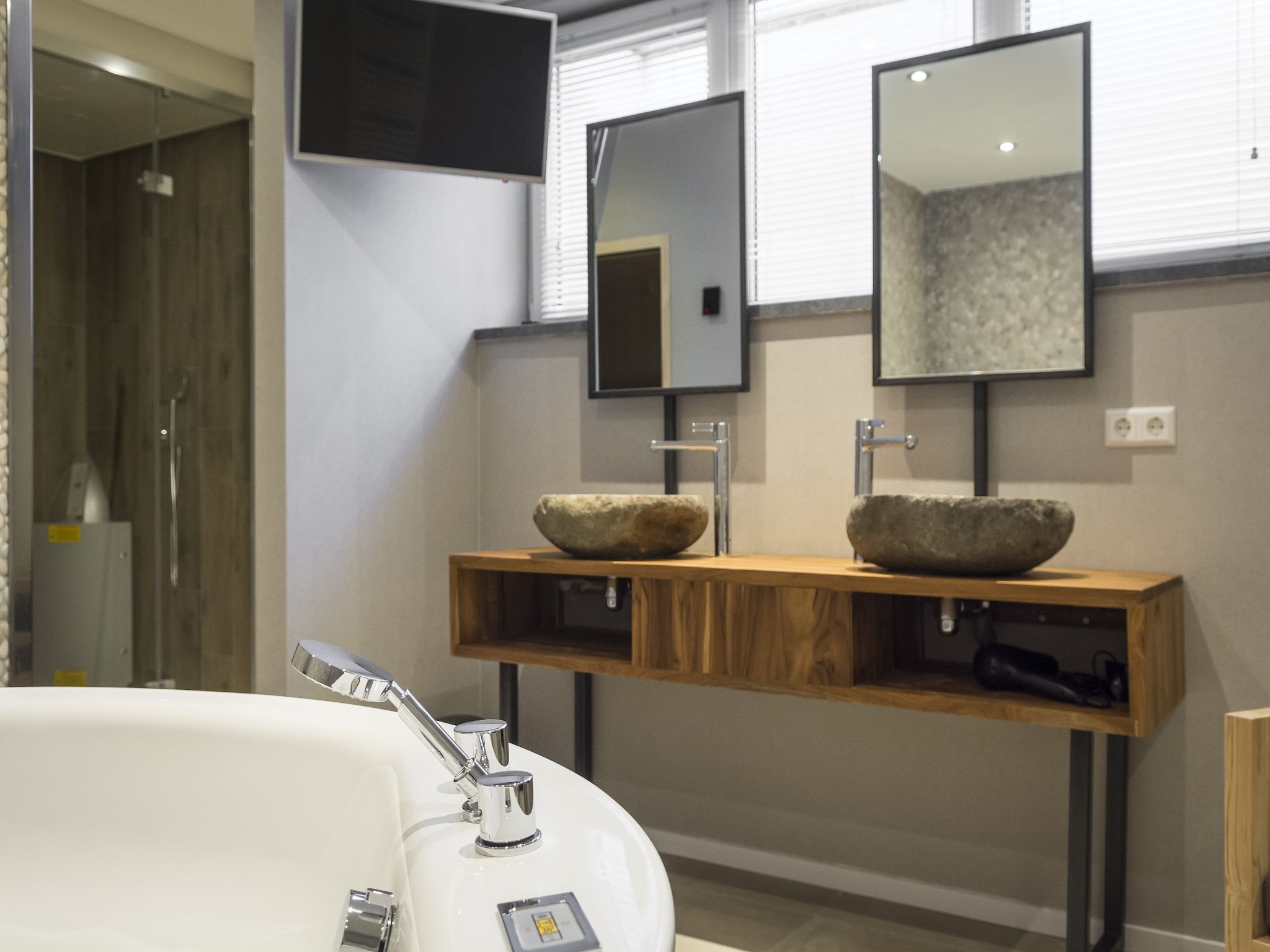 De badkamer van Villa Bouwlust F Wellness in De Cocksdorp Texel