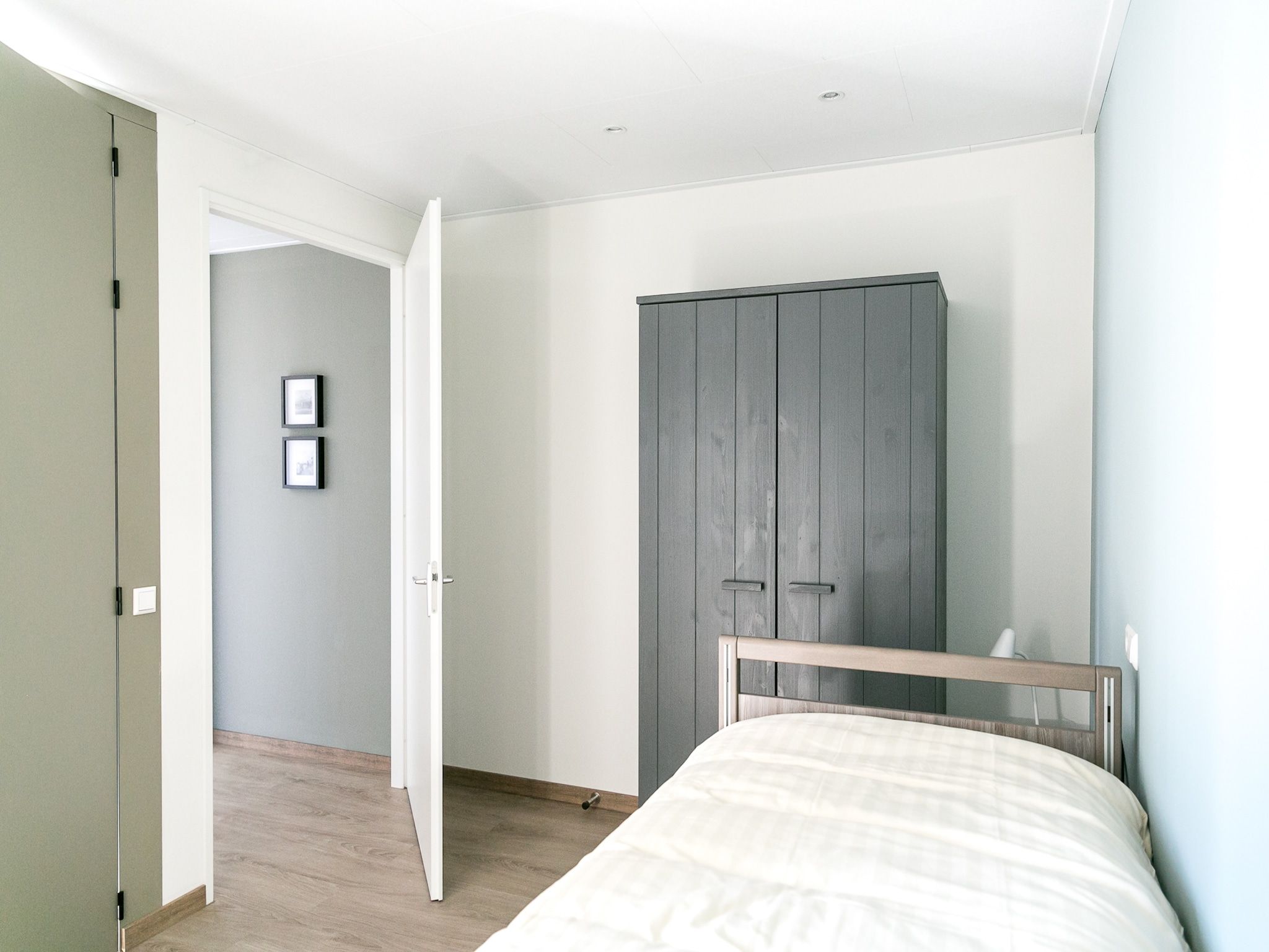 Een slaapkamer van Strandpark Vlugtenburg 9 in 's-Gravenzande