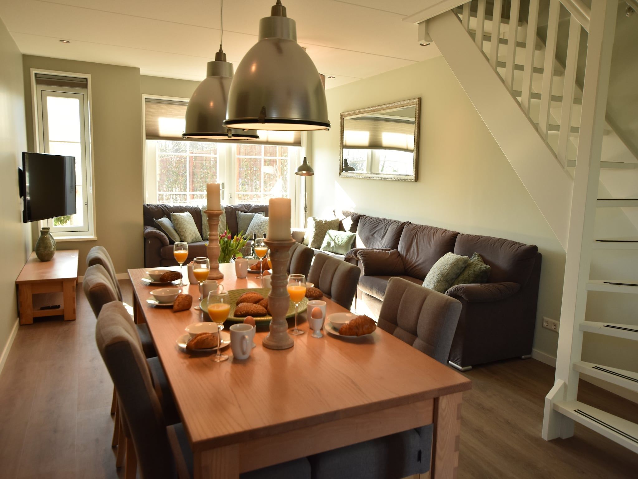 De woonkamer van Scoreldame XL in Schoorldam