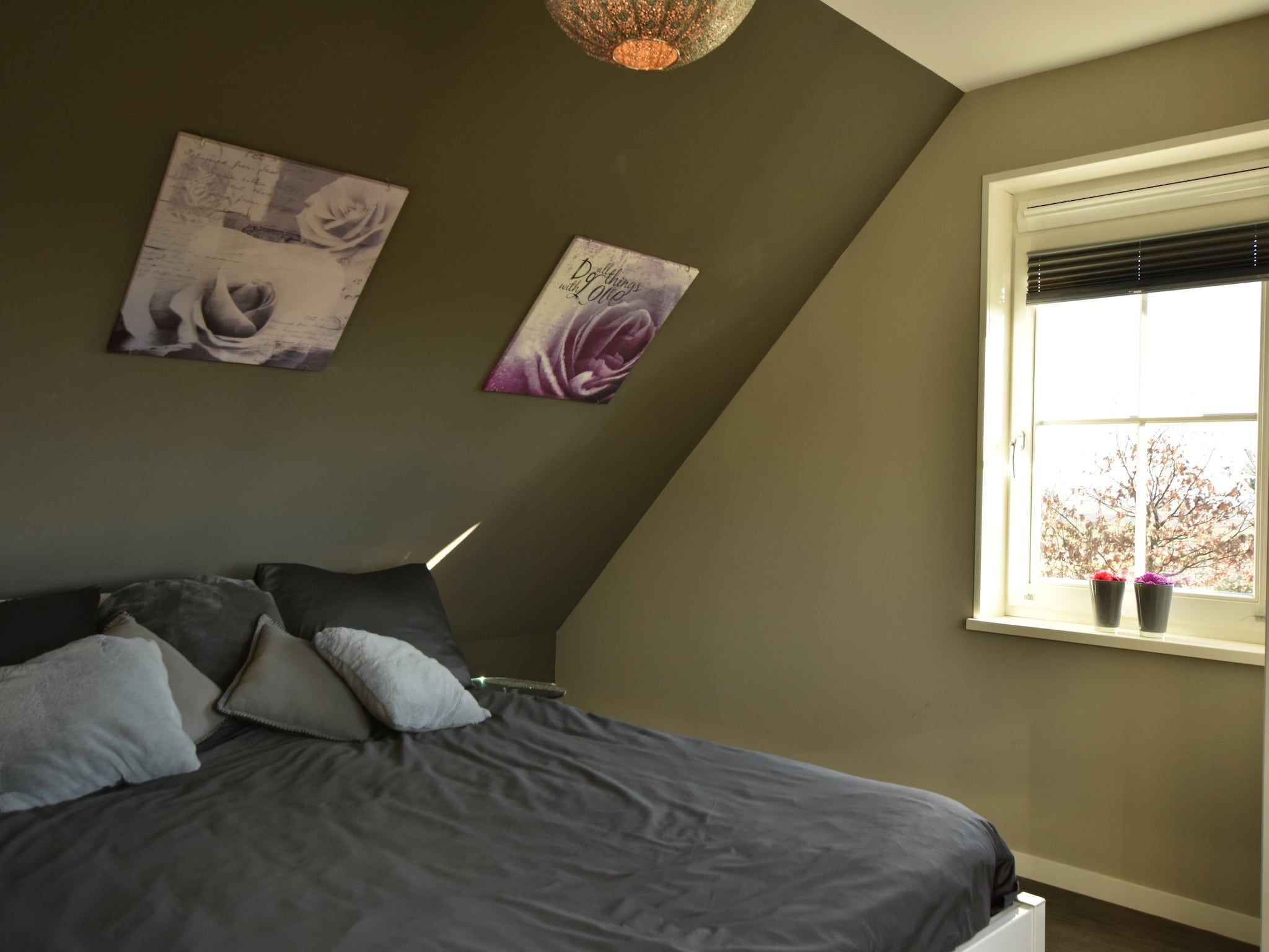 Een slaapkamer van Scoreldame XL in Schoorldam