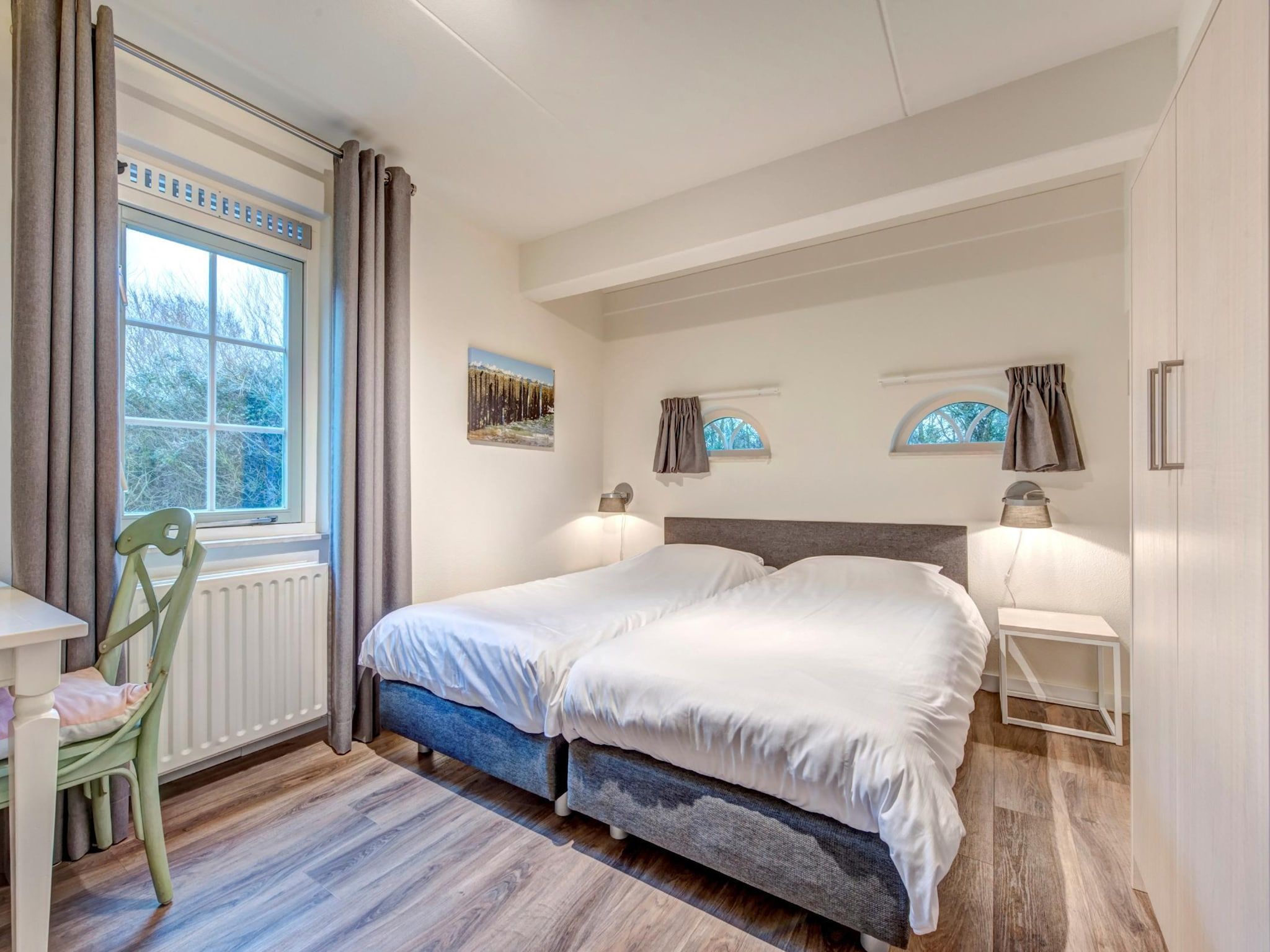 Een slaapkamer van Buitenhof Domburg 13 in Domburg