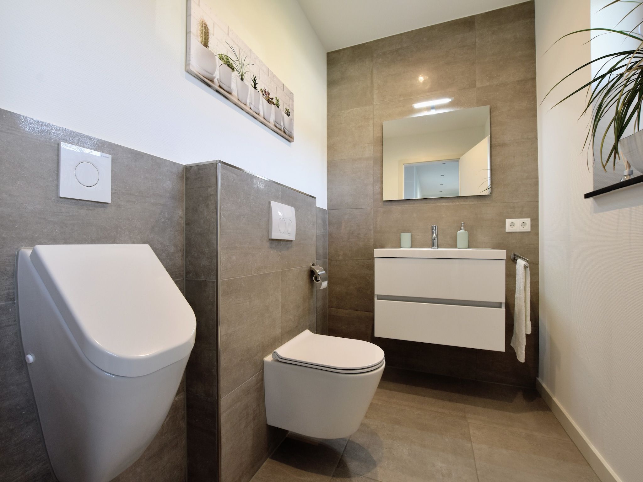 De badkamer van Villa Grenszicht in Megchelen