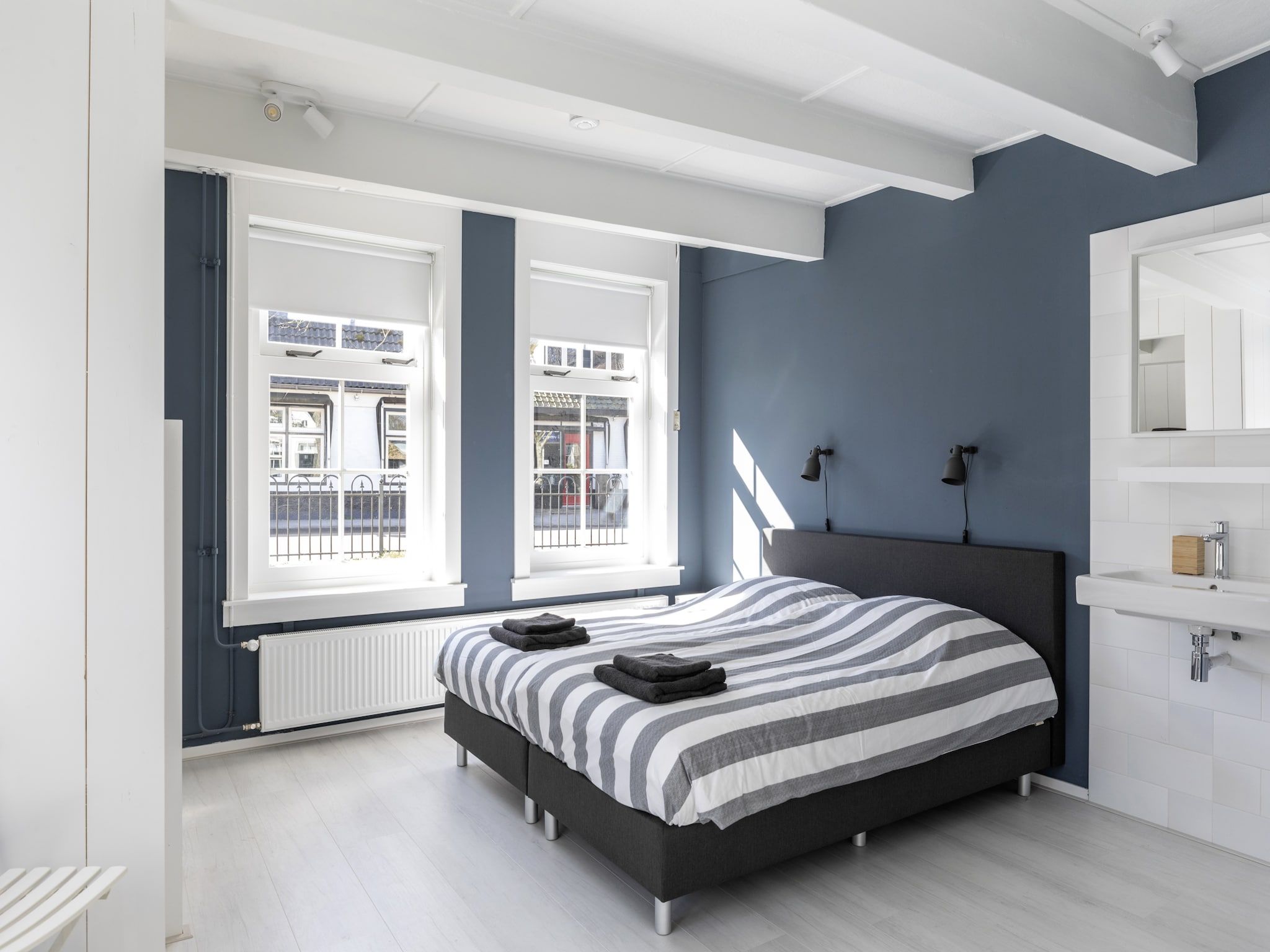 Een slaapkamer van De Groene Lantaarn in Groet (Schoorl)