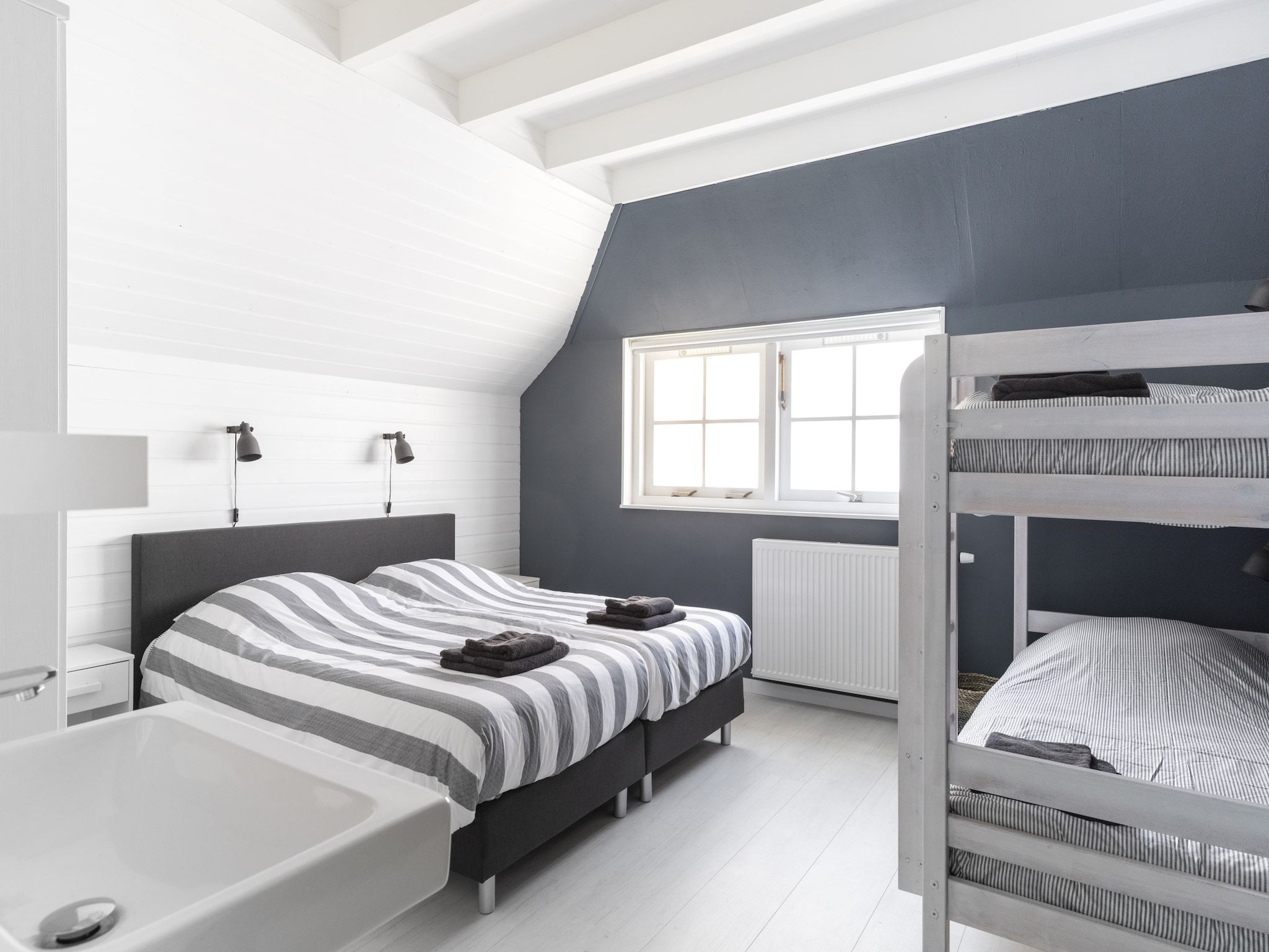 Een slaapkamer van De Groene Lantaarn in Groet (Schoorl)