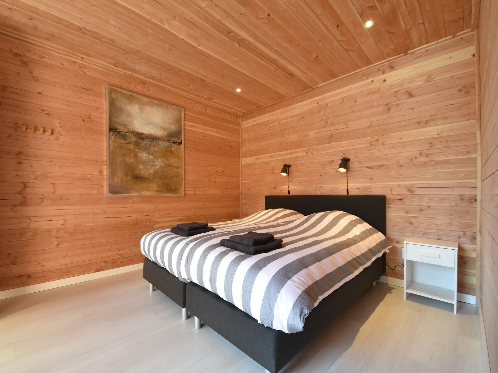 Een slaapkamer van De Groene Lantaarn in Groet (Schoorl)