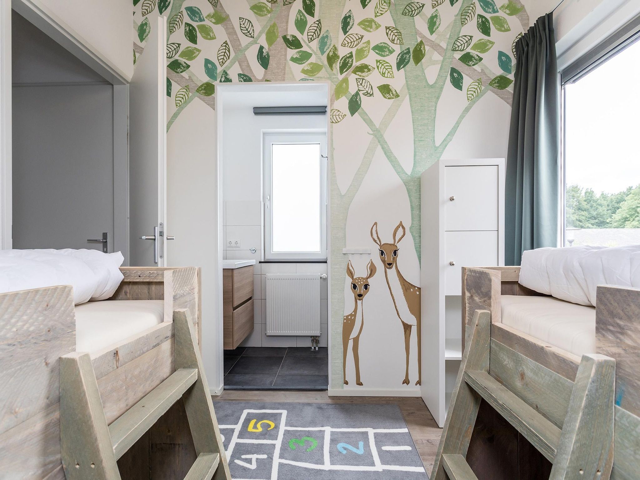 Een slaapkamer van Buitenhof De Leistert 27 in Roggel