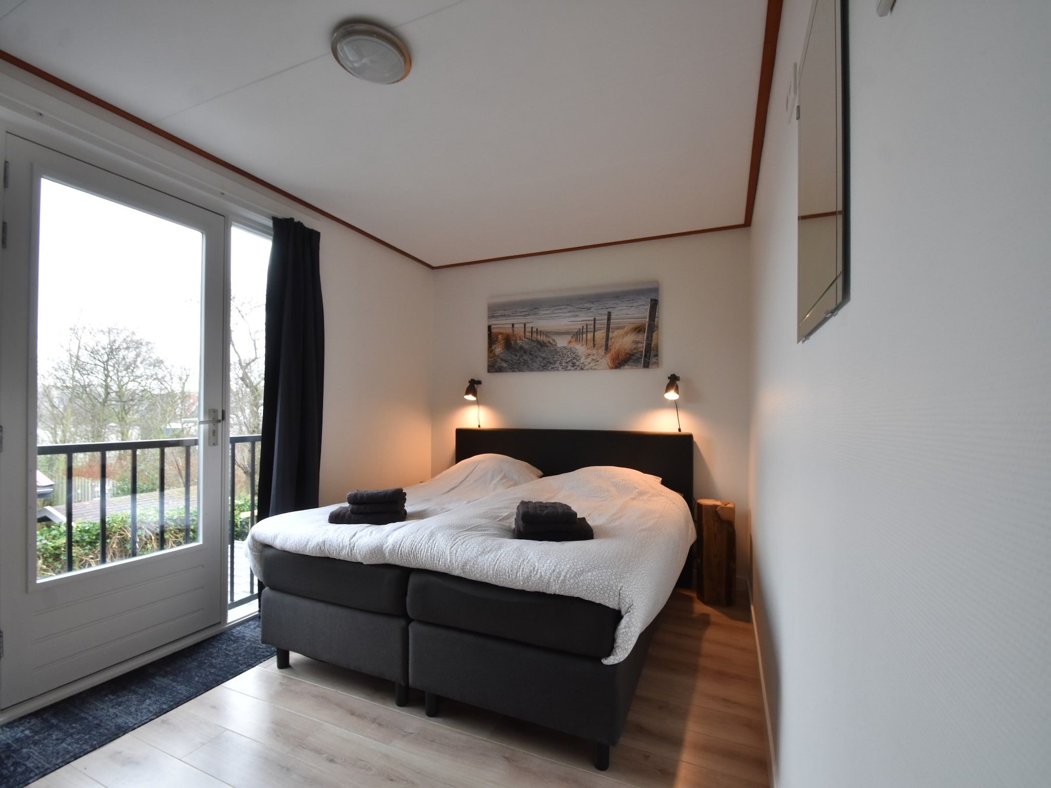 Een slaapkamer van 8p Garnekuul 1 in Callantsoog